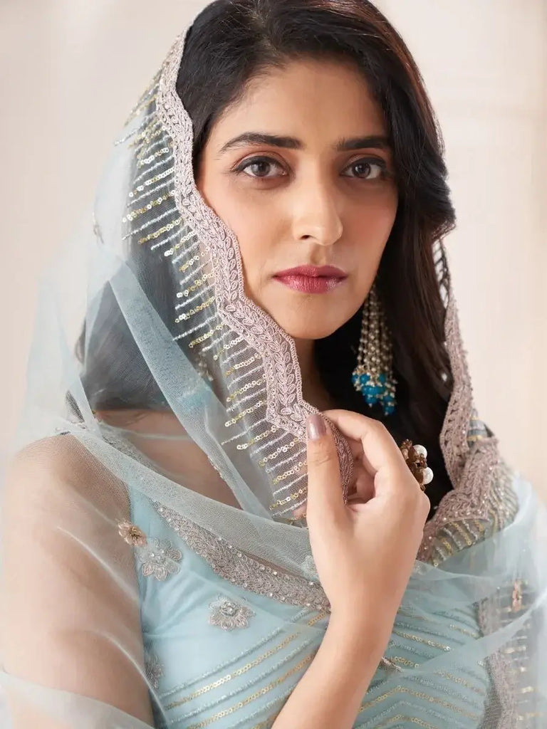 Dazzling Turquoise Dori Work Soft Net Events Wear Lehenga Choli