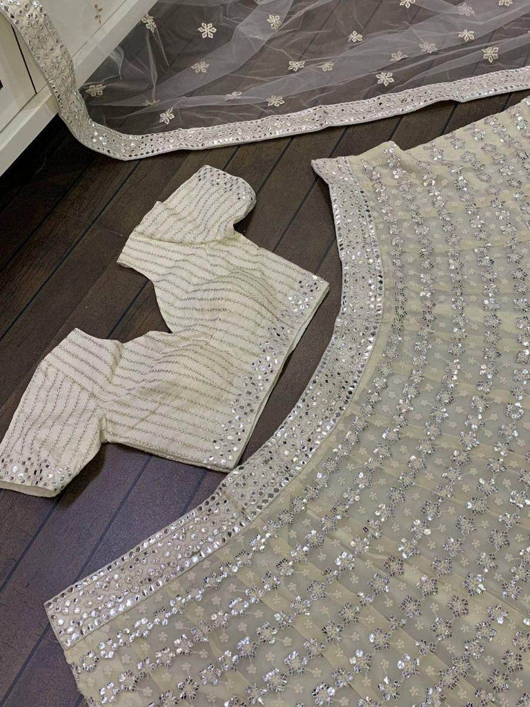 Wonderful Cream Sequined Georgette Sangeet Wear Lehenga Choli