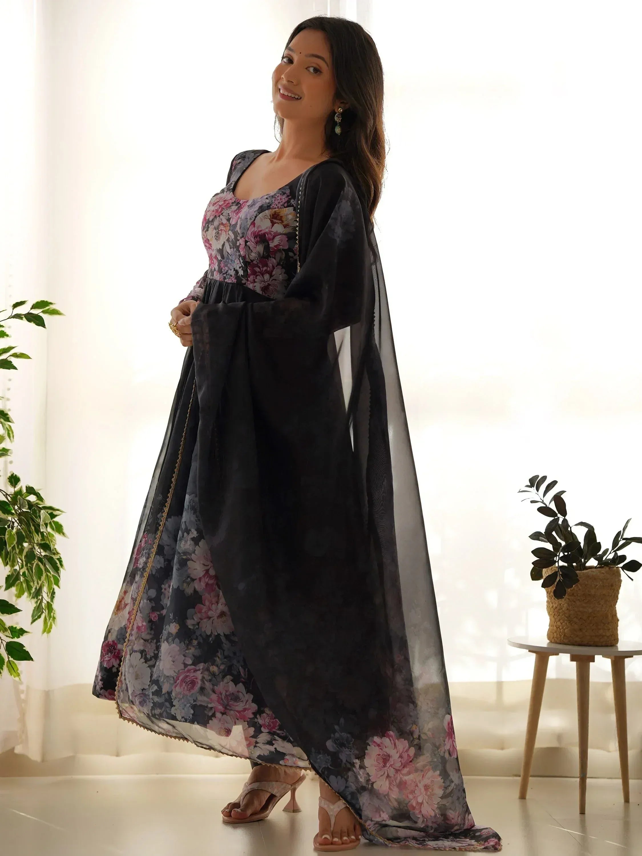 Floral print ethnic gown with black overlay, perfect for Indian occasions and festive wear