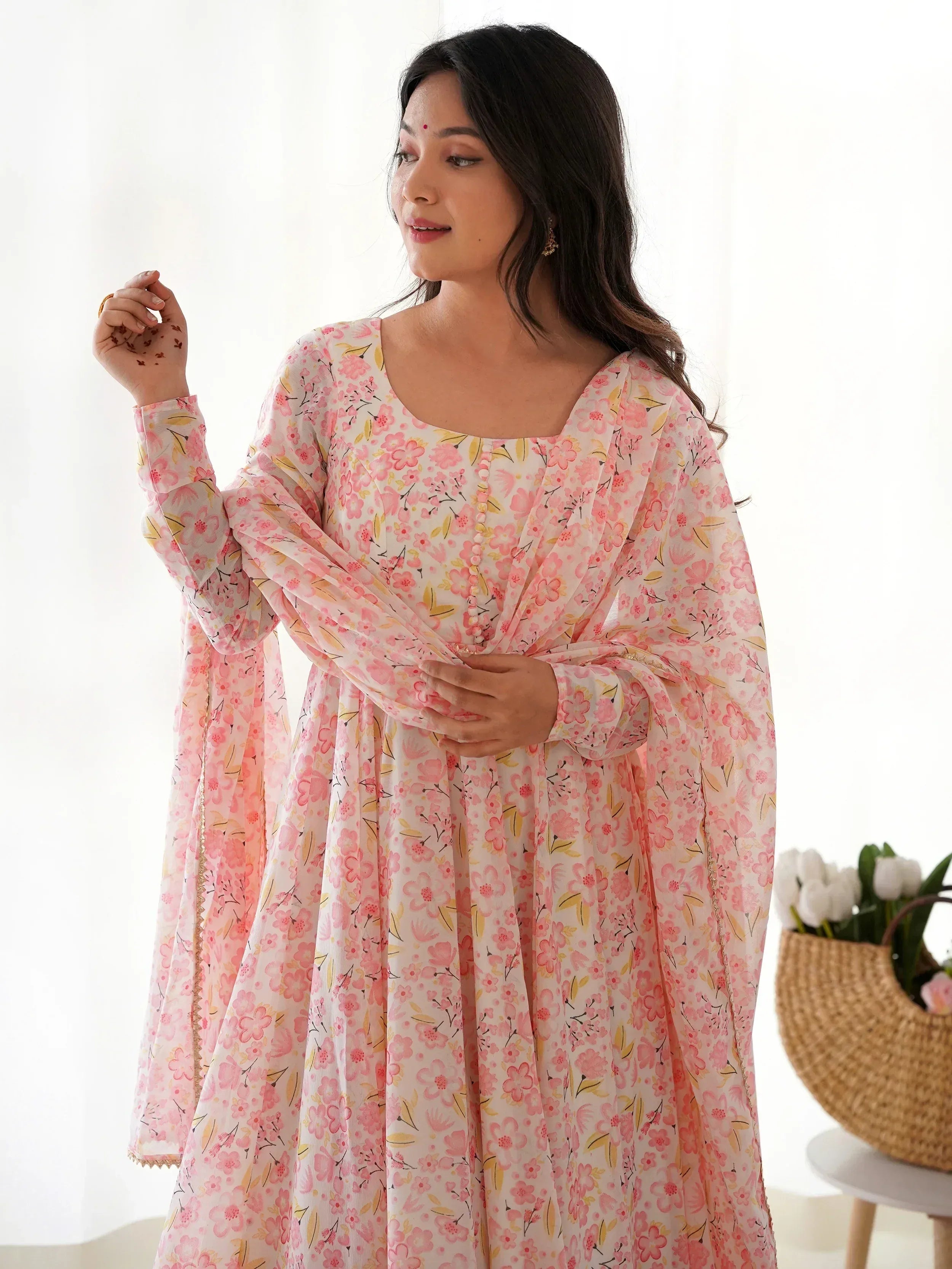 Pink floral print ethnic gown with long sleeves, perfect for Indian occasions and festive wear.