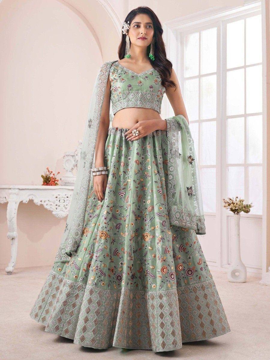 Mint green embroidered lehenga choli with floral motifs and matching dupatta, perfect for Indian ethnic occasions