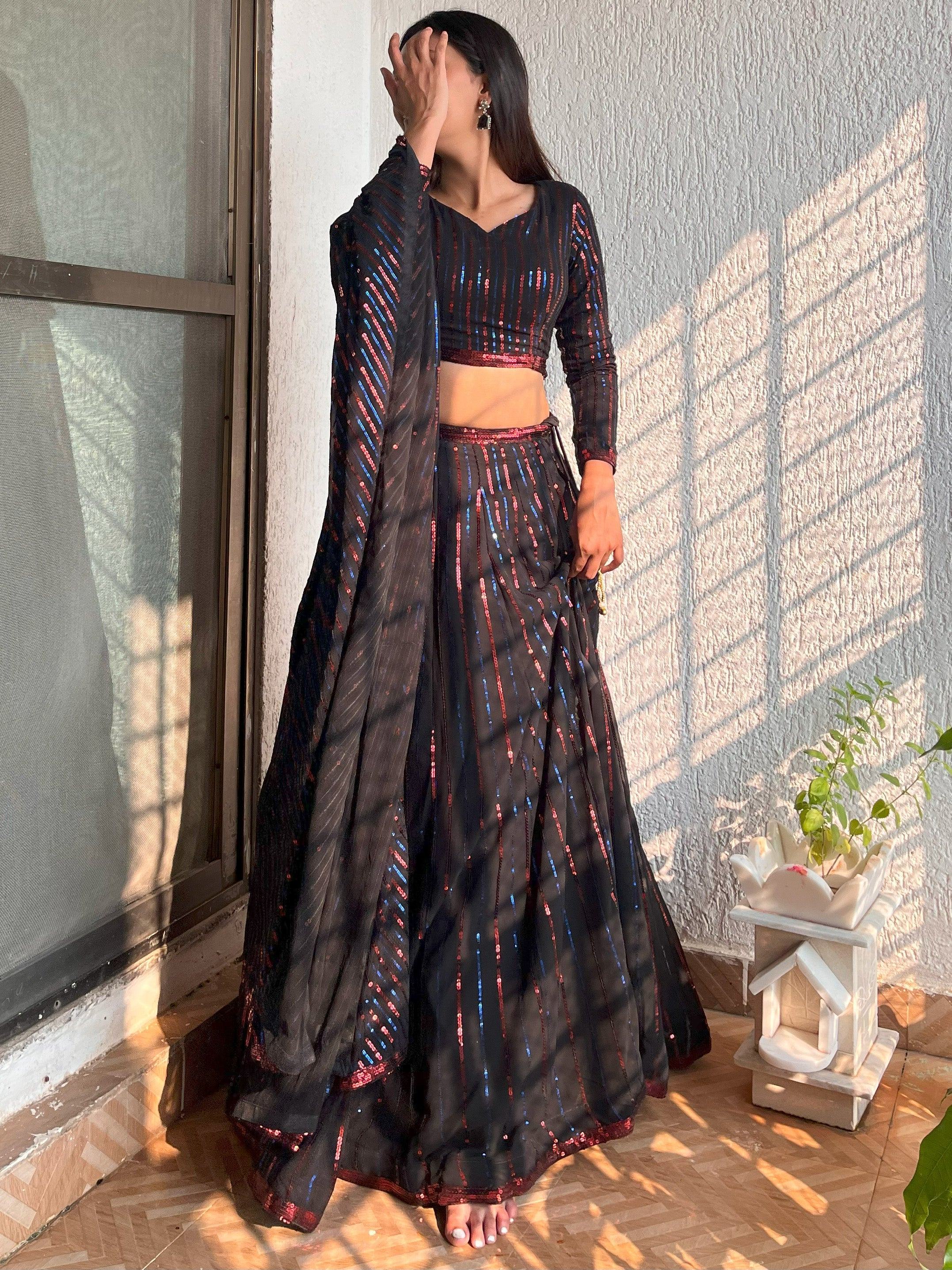 Black sequin lehenga choli with red and blue stripes, perfect for Indian ethnic wear events