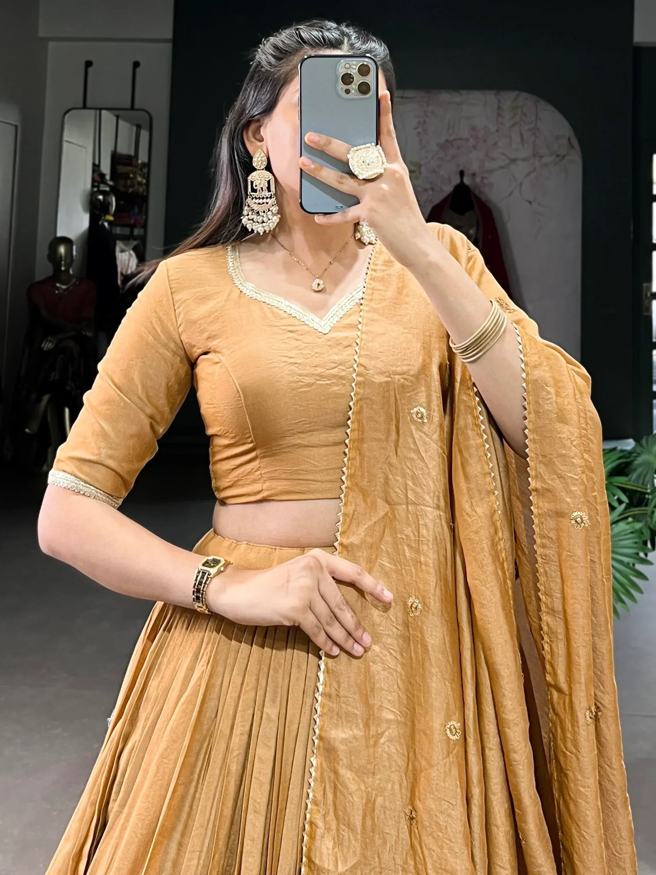 Mustard yellow lehenga choli with gold embroidery, perfect for Indian ethnic wear and festive occasions.