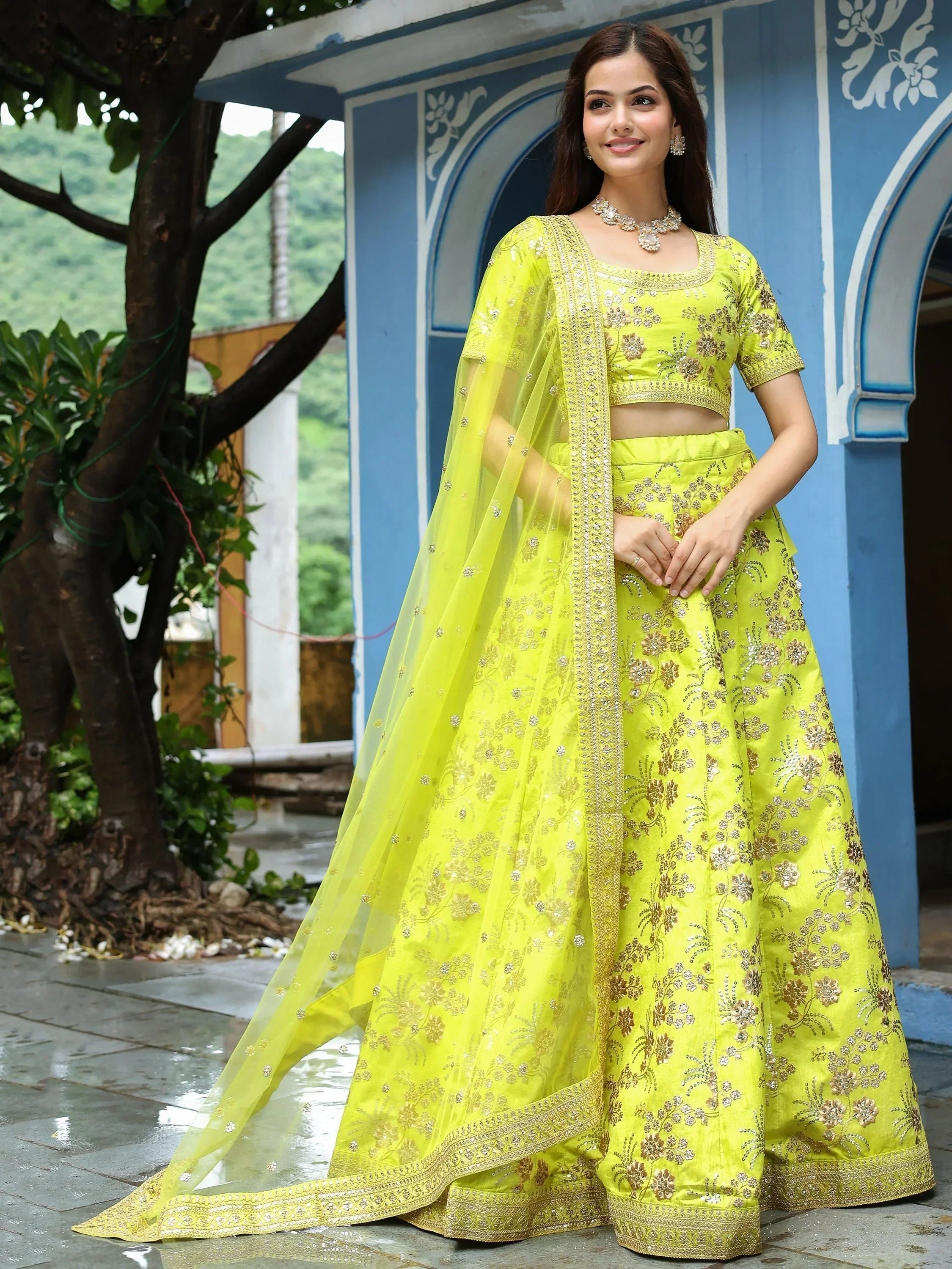 Lime green embroidered lehenga choli with floral zari work, perfect for Indian ethnic wear occasions