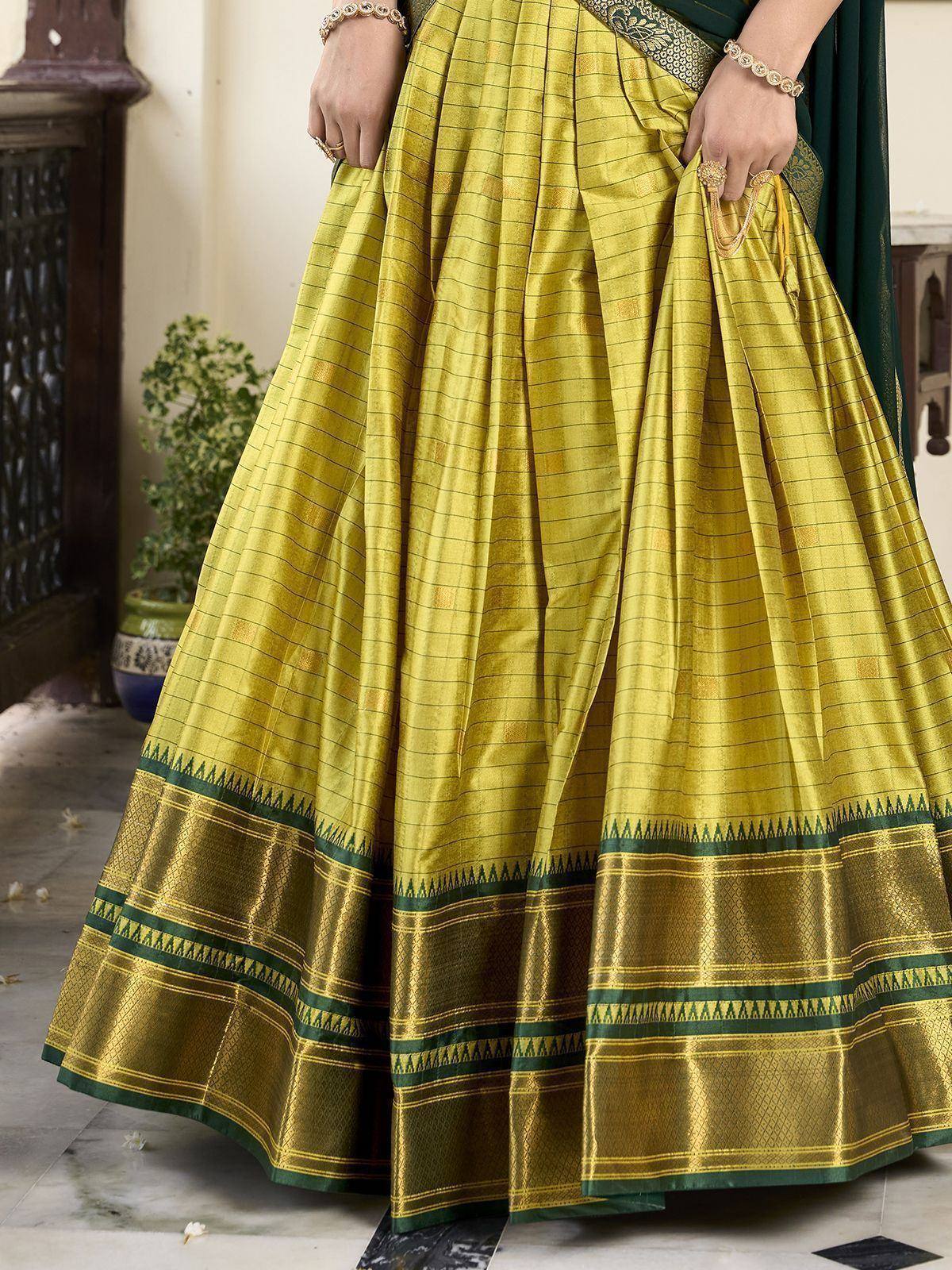 Yellow and green checkered silk lehenga with intricate border, perfect for Indian ethnic wear