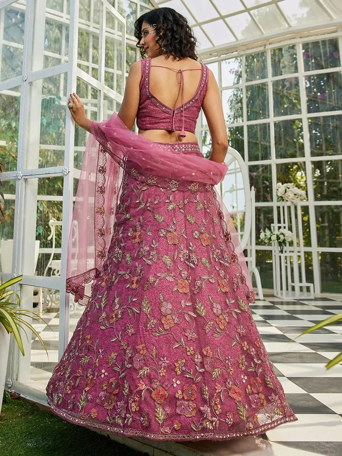 Pink floral embroidered lehenga choli with back tie blouse, perfect for Indian weddings and festive occasions