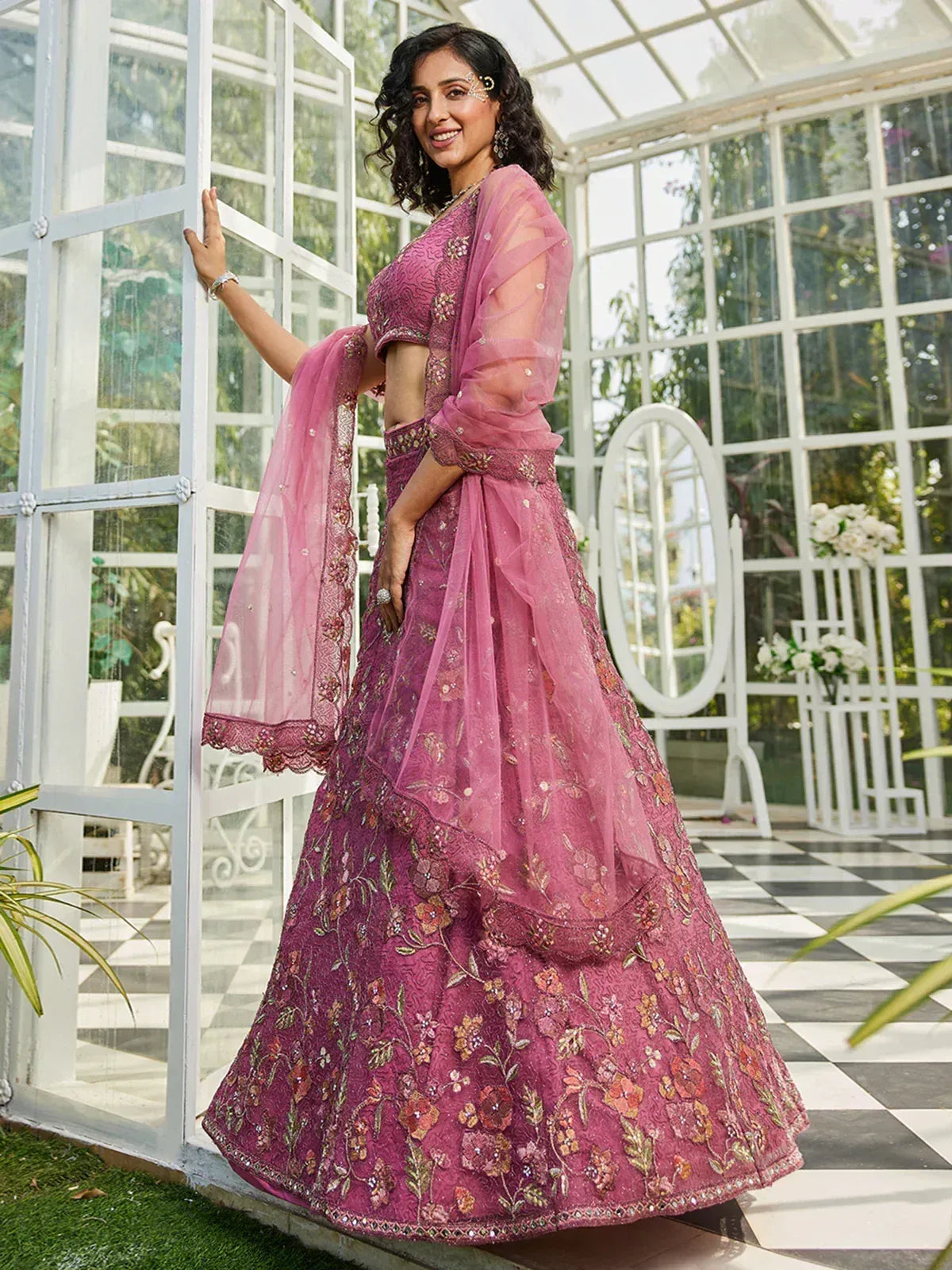 Pink floral embroidered lehenga choli with sheer dupatta, perfect for Indian ethnic occasions