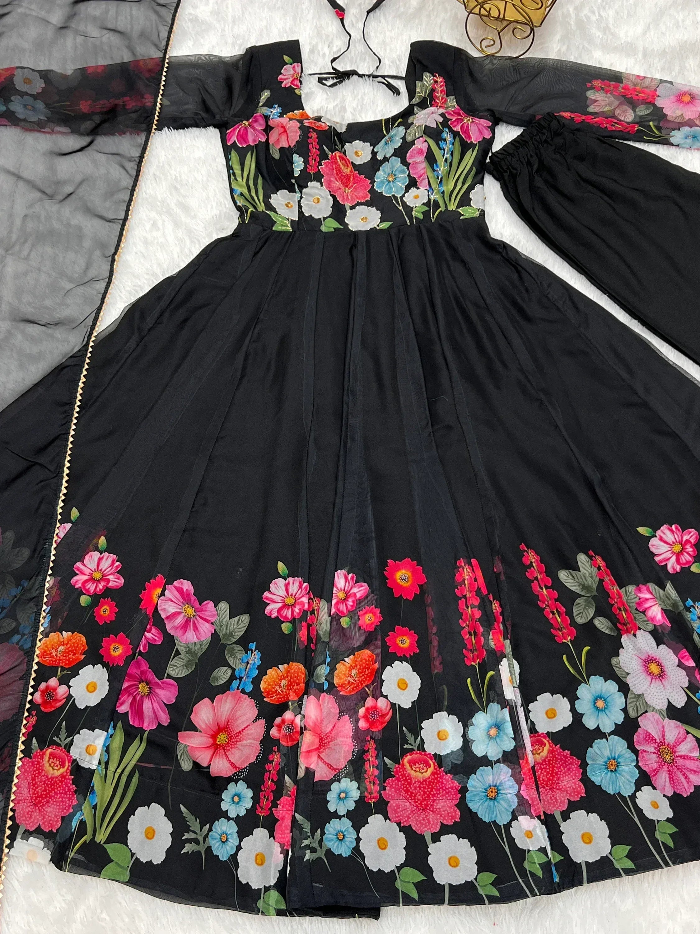 Black floral print ethnic gown with vibrant flowers, perfect for Indian occasions and festive wear.