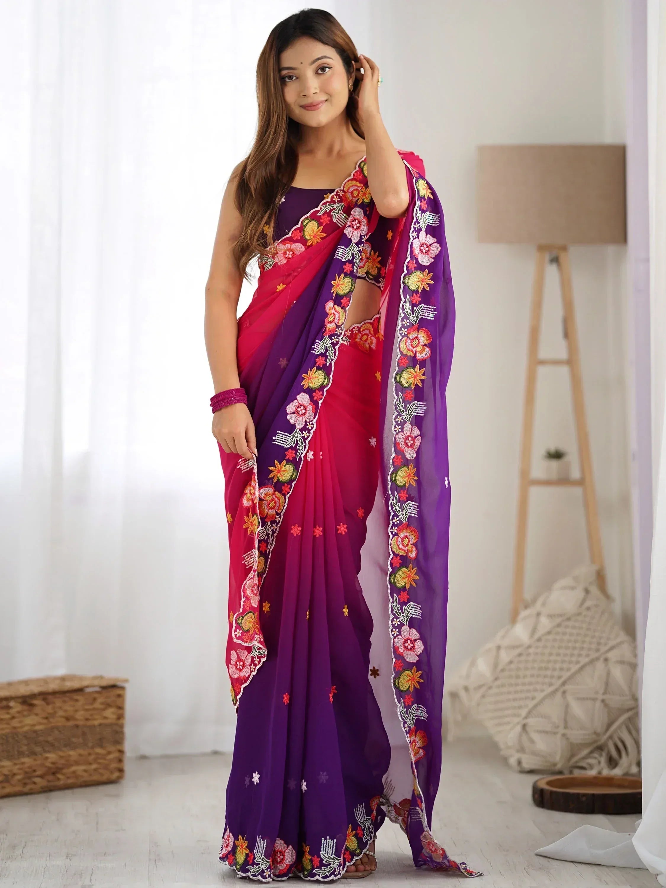 Purple and pink embroidered saree with floral designs, perfect for Indian ethnic wear