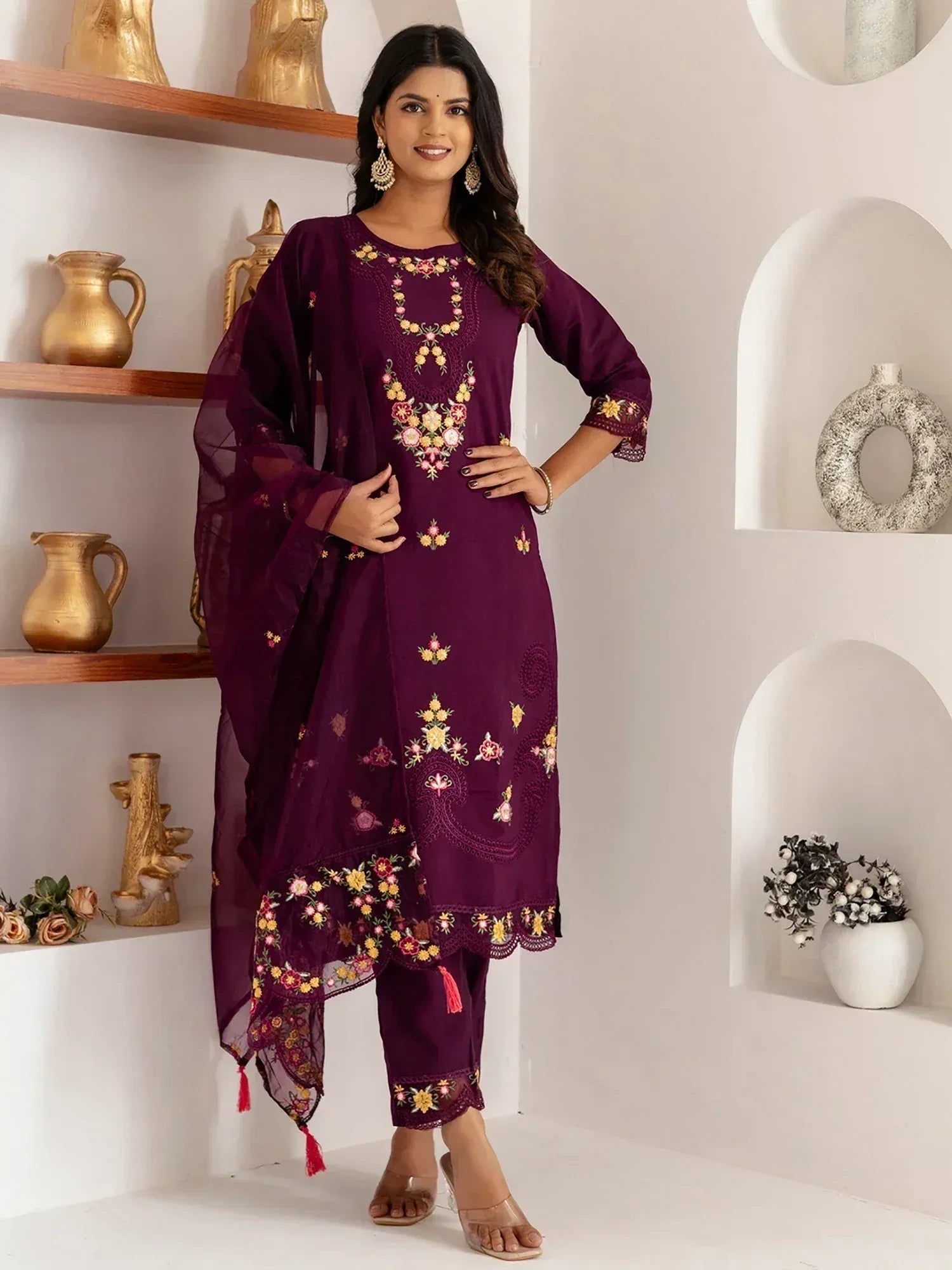 Purple embroidered salwar kameez with floral design, matching dupatta, and pants for ethnic wear