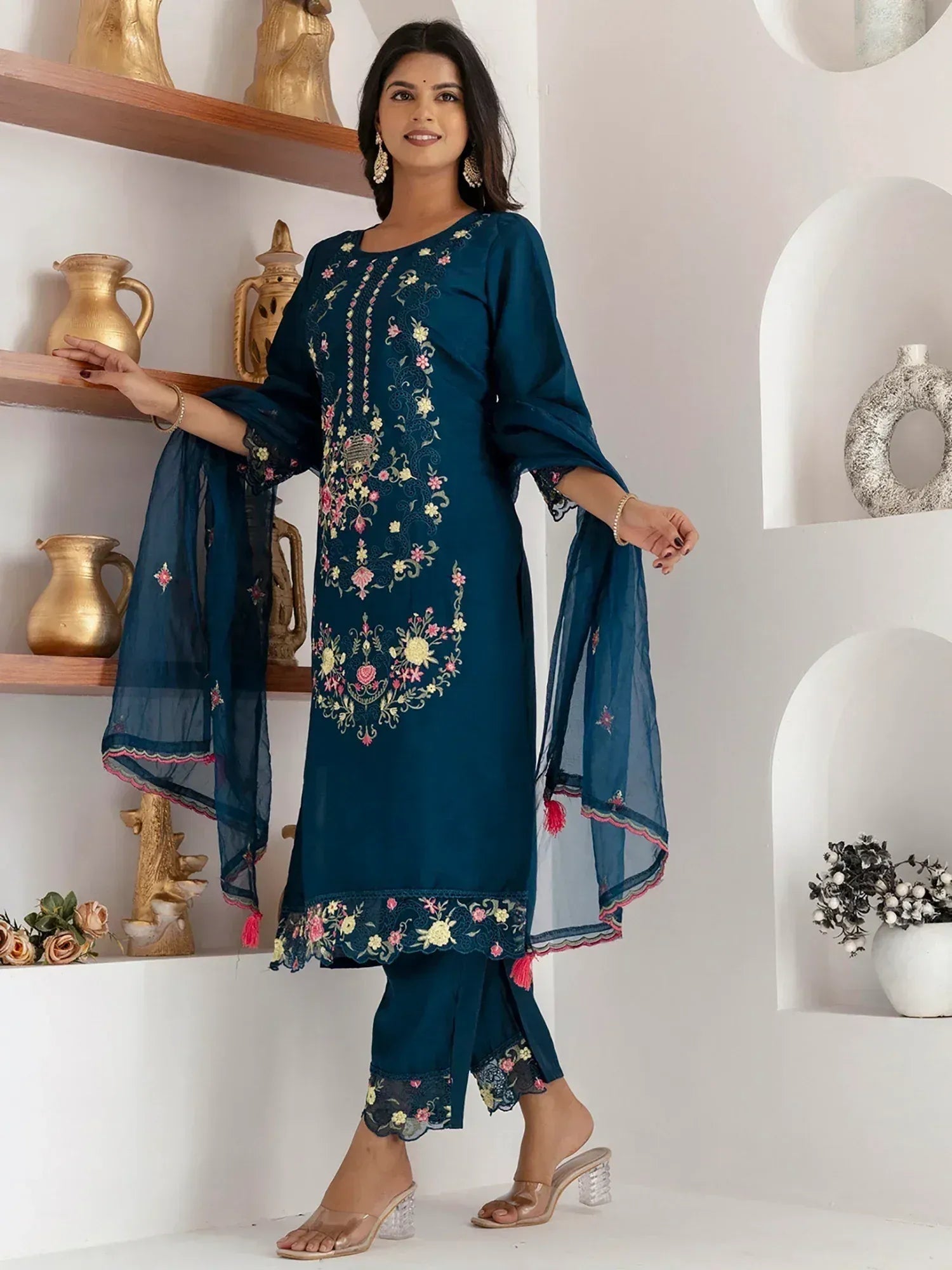 Teal embroidered salwar kameez with floral design, matching dupatta, and palazzo pants for ethnic wear
