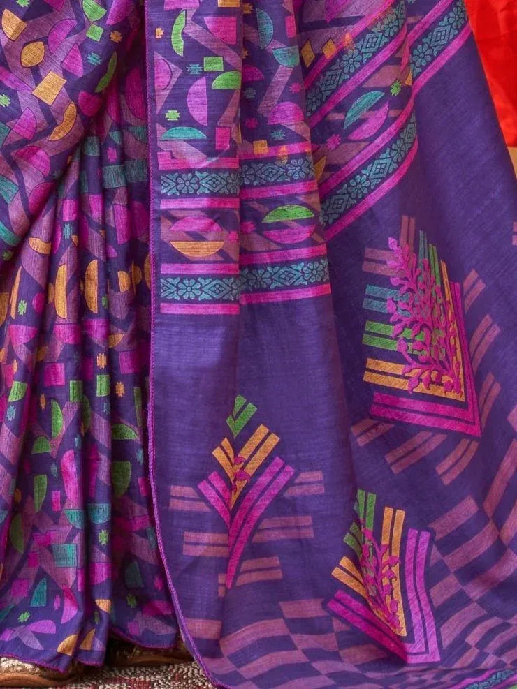 Purple printed saree with geometric and floral motifs, vibrant ethnic wear design