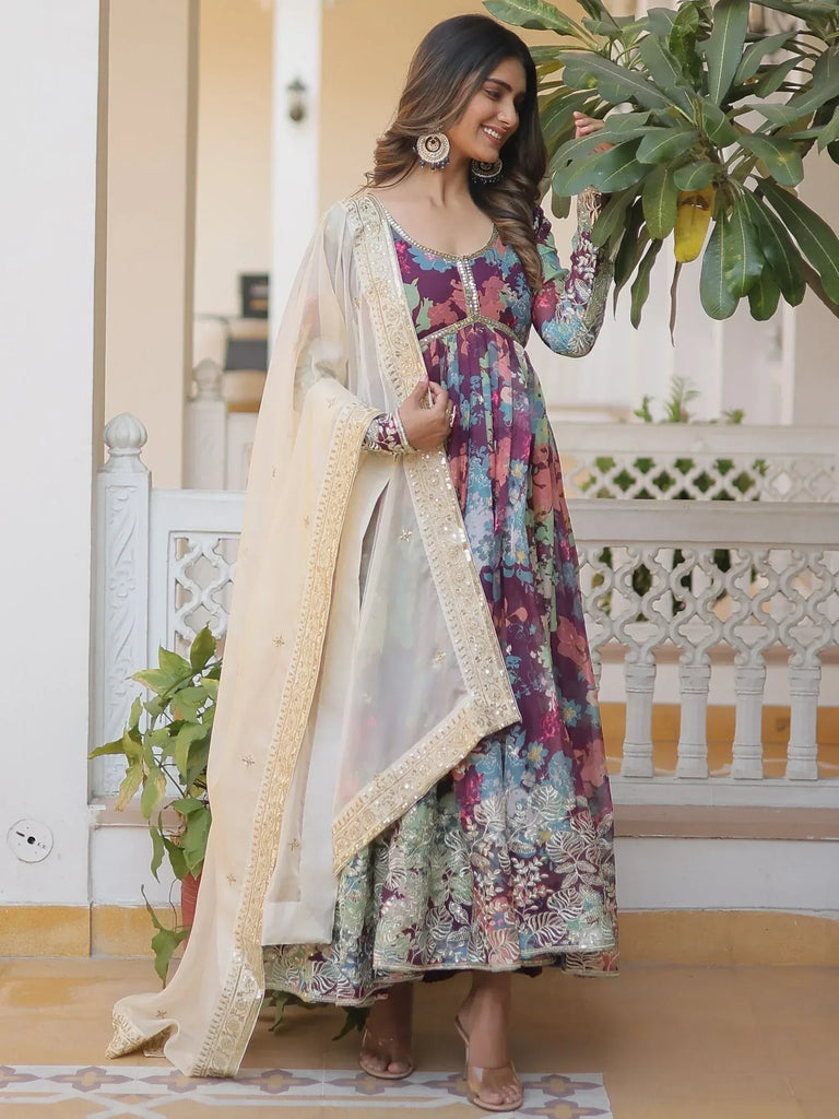 Woman in floral print Indian anarkali with embroidered dupatta, perfect for ethnic occasions