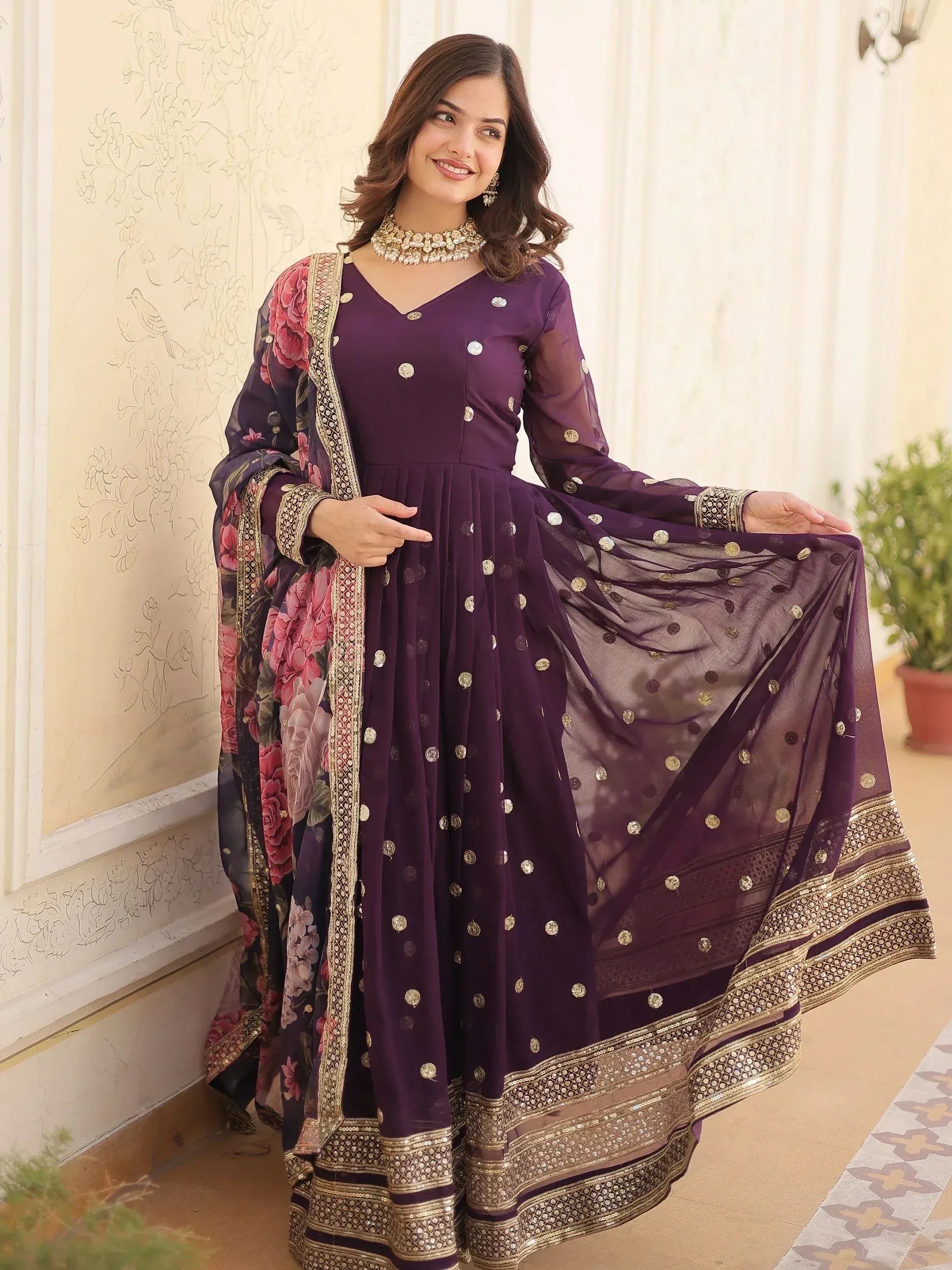 Purple ethnic anarkali with gold embroidery and floral dupatta, perfect for Indian festive occasions