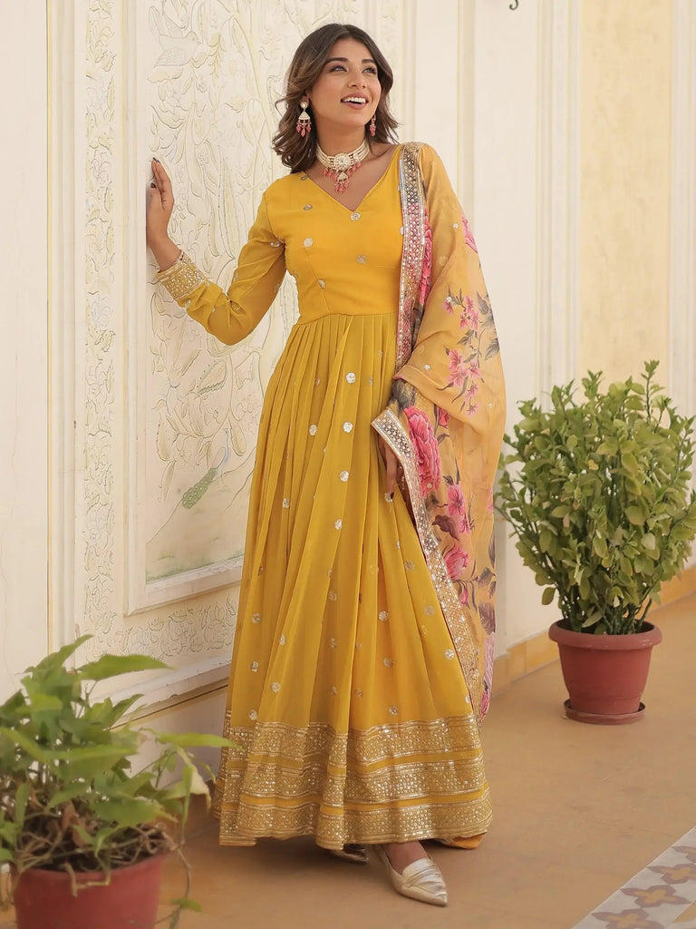 Bewitching Yellow Embroidered Georgette Haldi Wear Gown With Dupatta