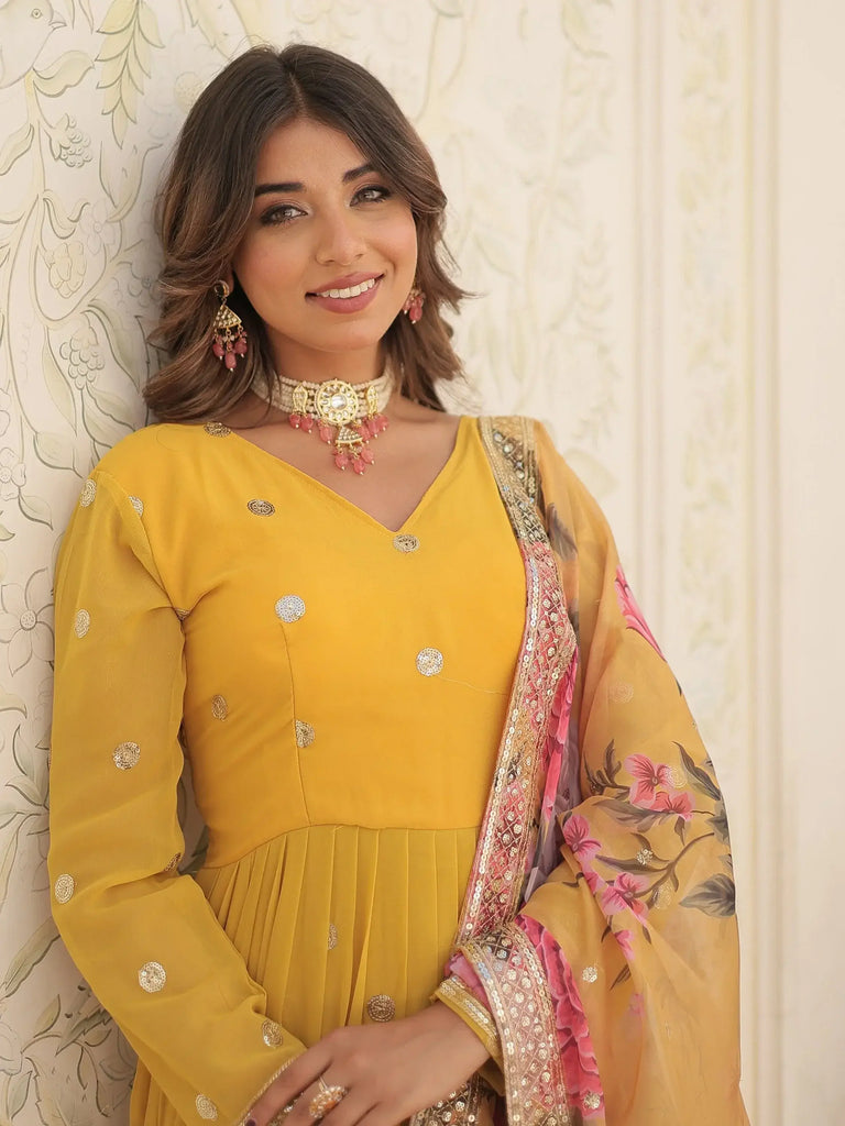 Bewitching Yellow Embroidered Georgette Haldi Wear Gown With Dupatta