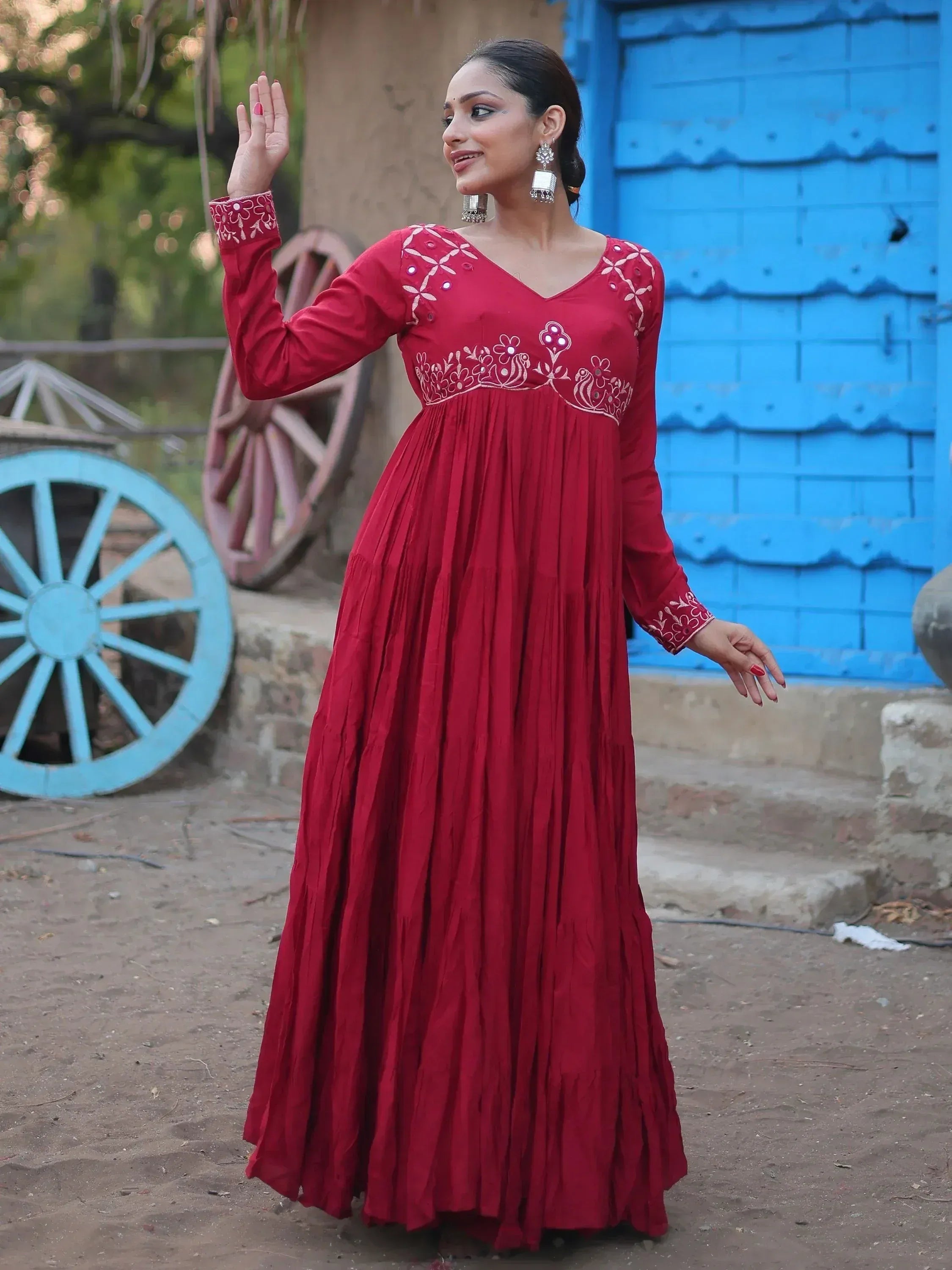 Red ethnic gown with floral embroidery, perfect for Indian festive occasions and weddings.