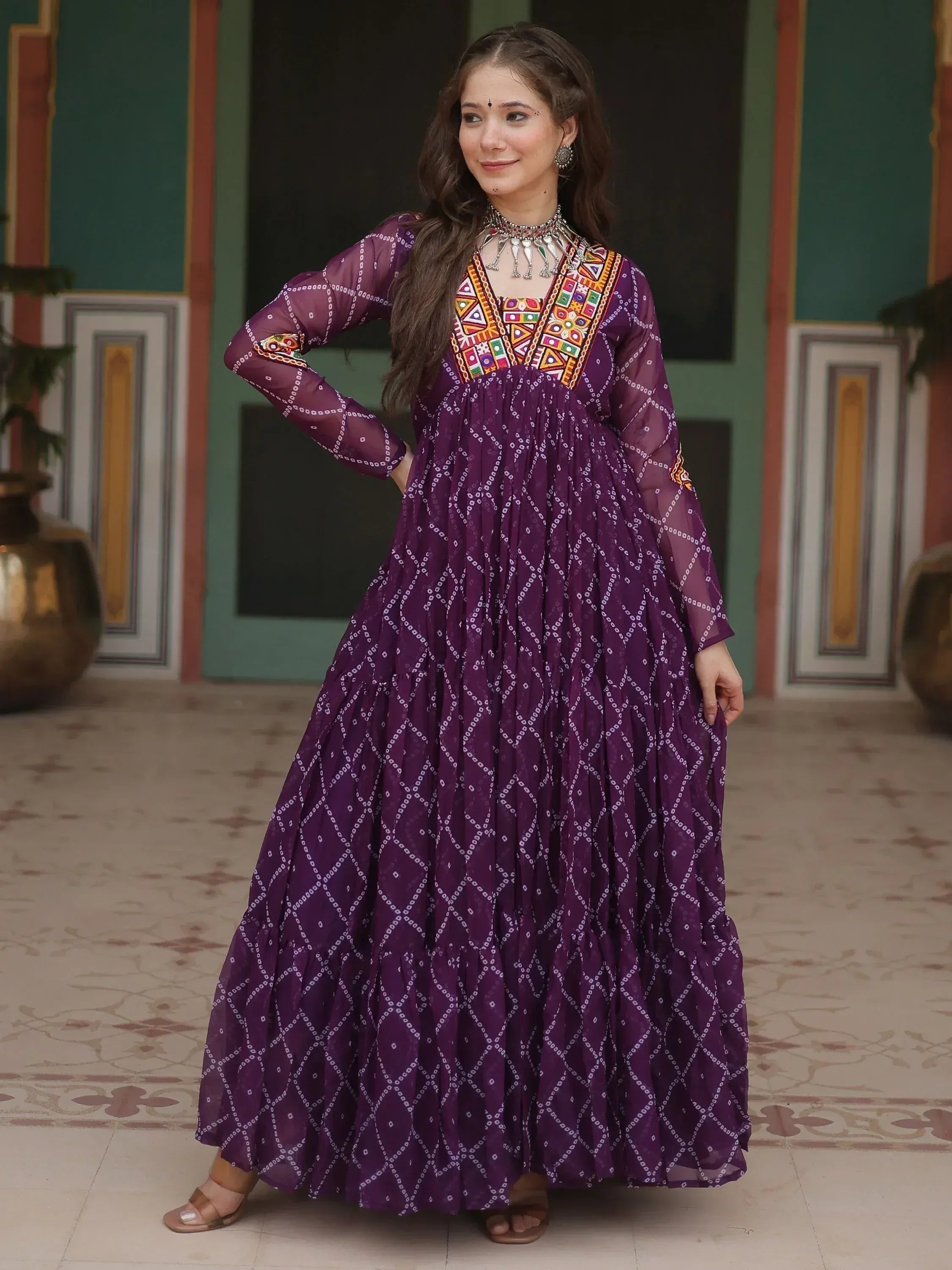 Purple ethnic gown with geometric print and colorful embroidery, perfect for Indian festive wear