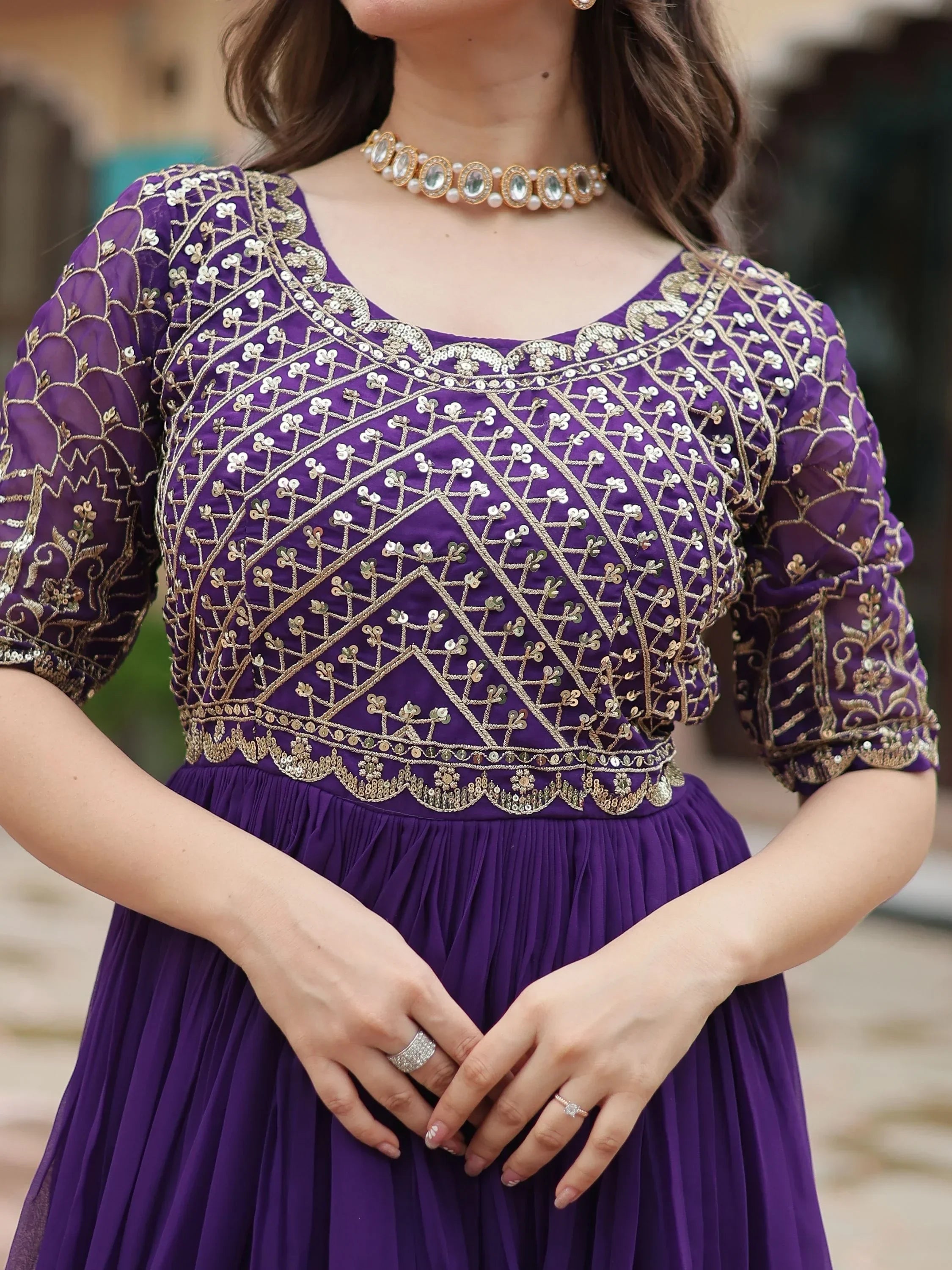 Purple embroidered ethnic gown with gold sequin detailing, half sleeves, and scoop neckline