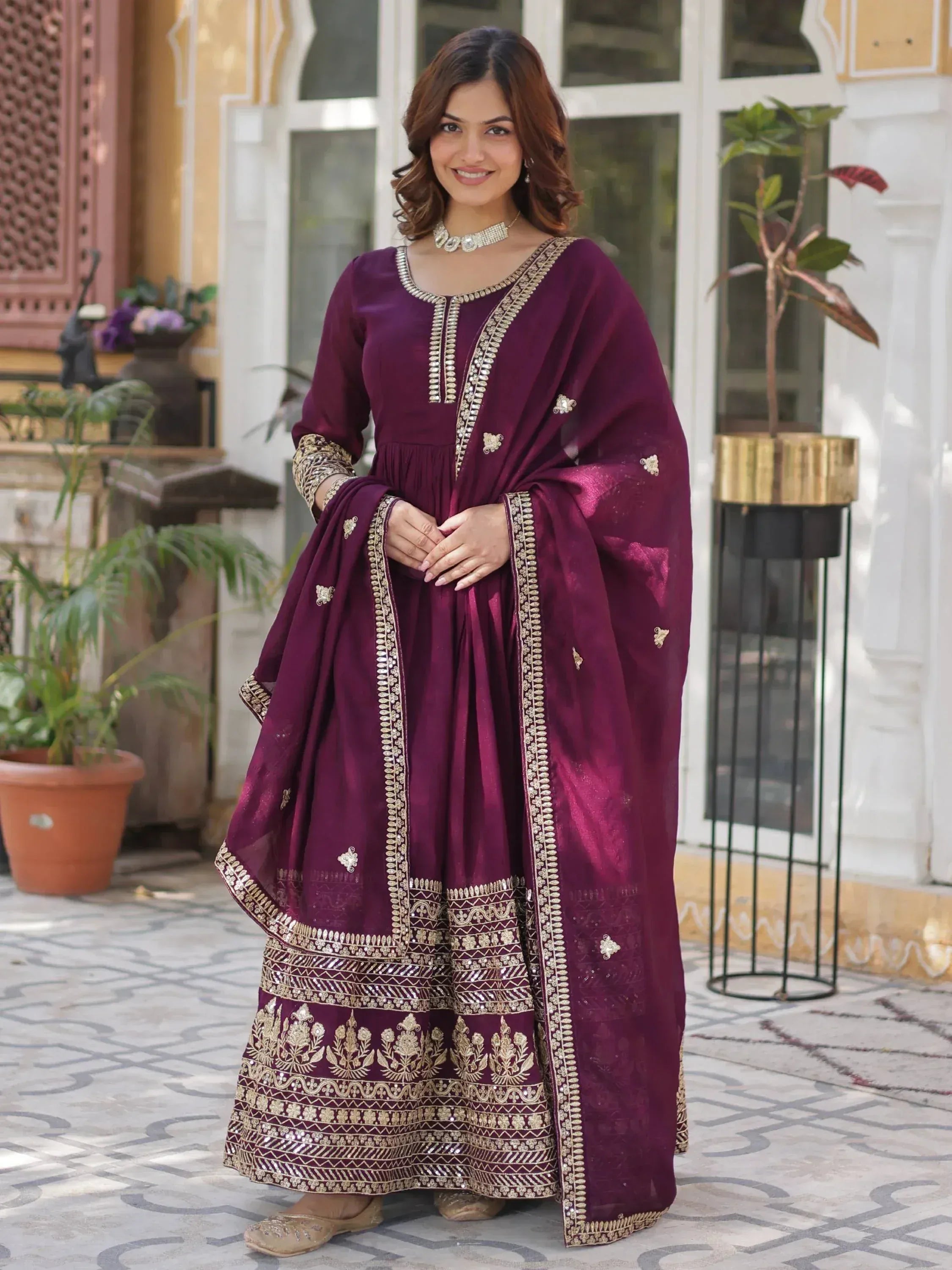 Elegant maroon ethnic anarkali suit with gold embroidery and dupatta for festive occasions