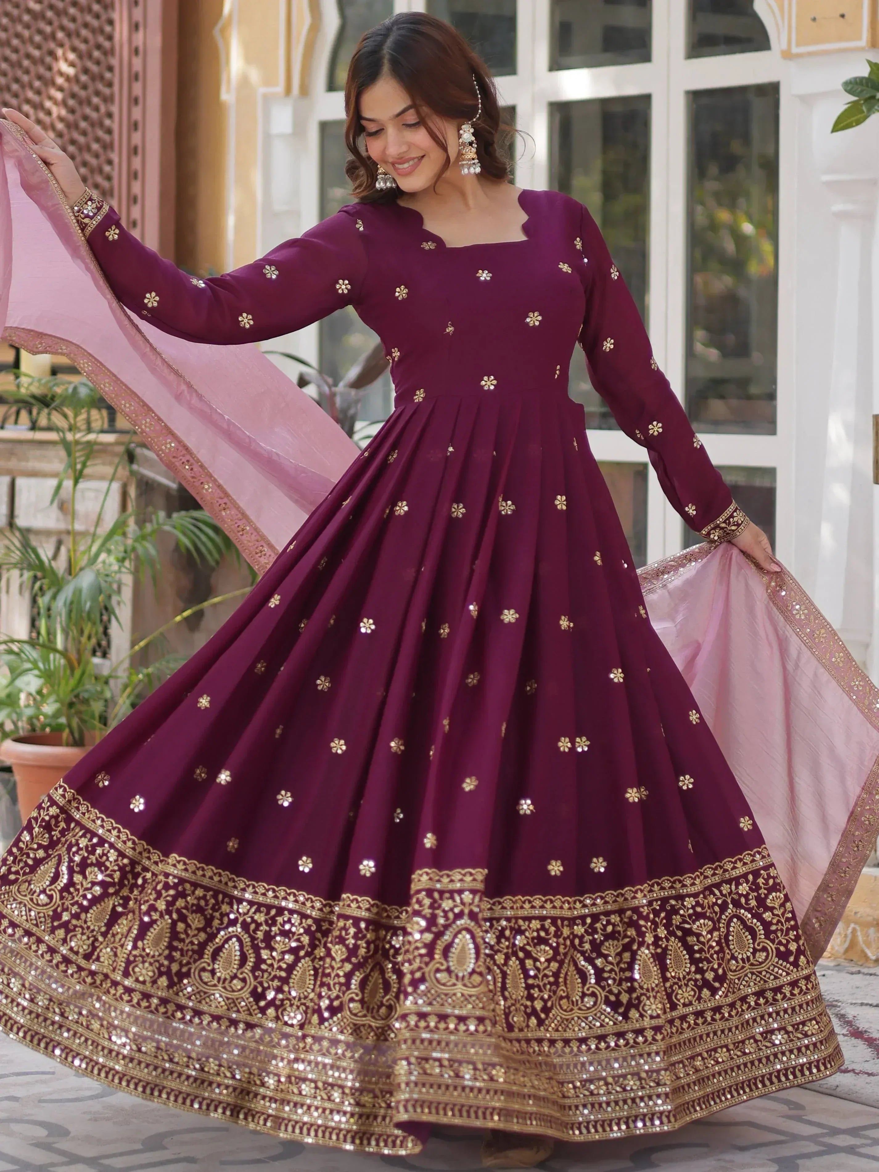 Elegant maroon anarkali with gold embroidery and pink dupatta for Indian ethnic wear