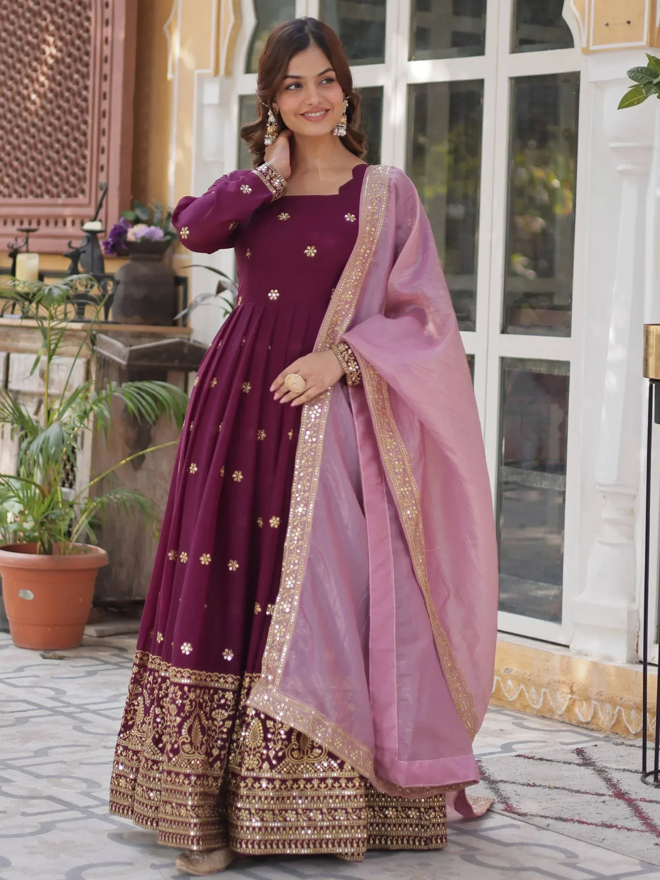 Elegant maroon anarkali with gold embroidery and pink dupatta for Indian ethnic wear