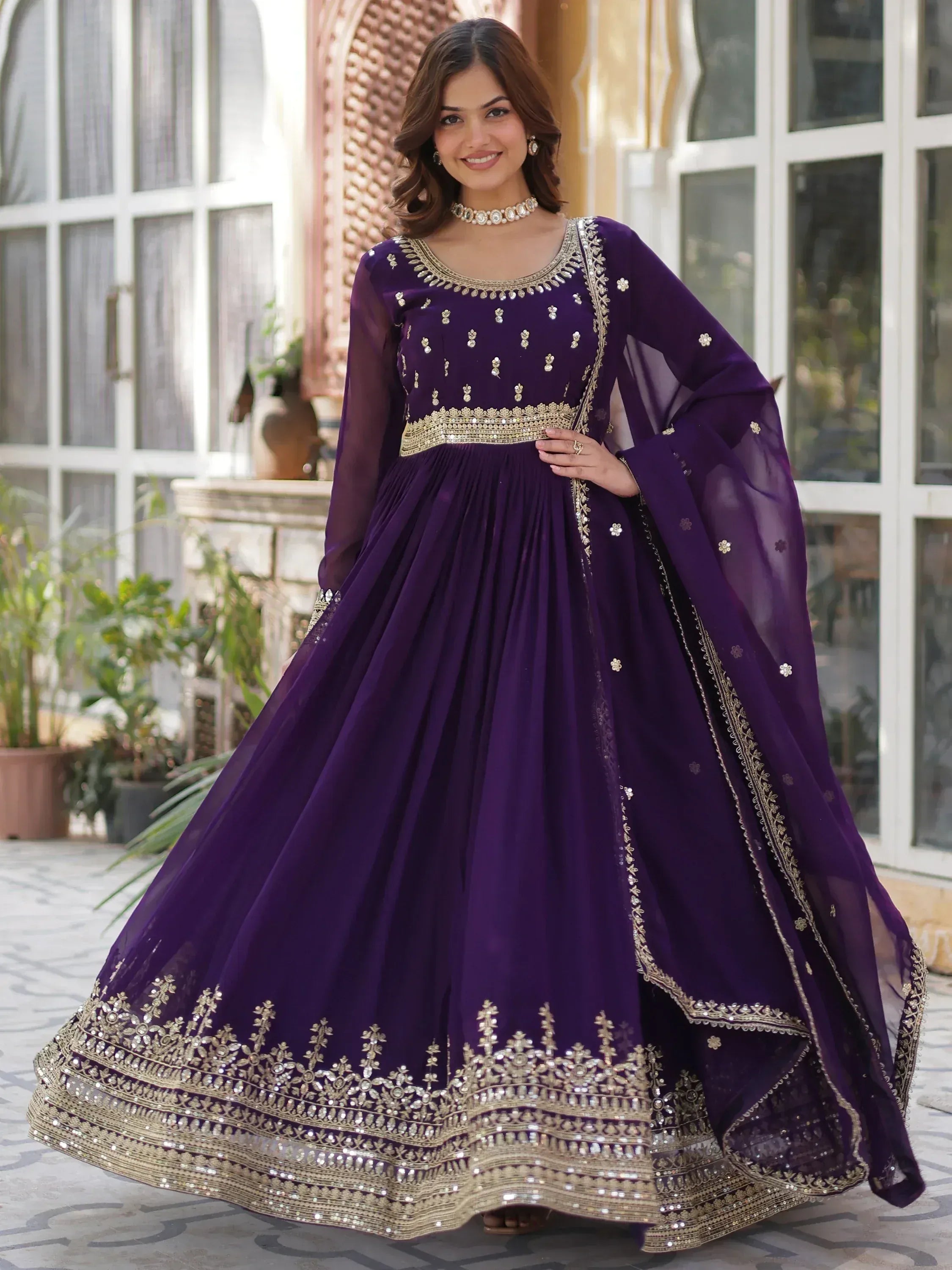 Purple designer anarkali with gold embroidery, perfect for Indian ethnic wear occasions