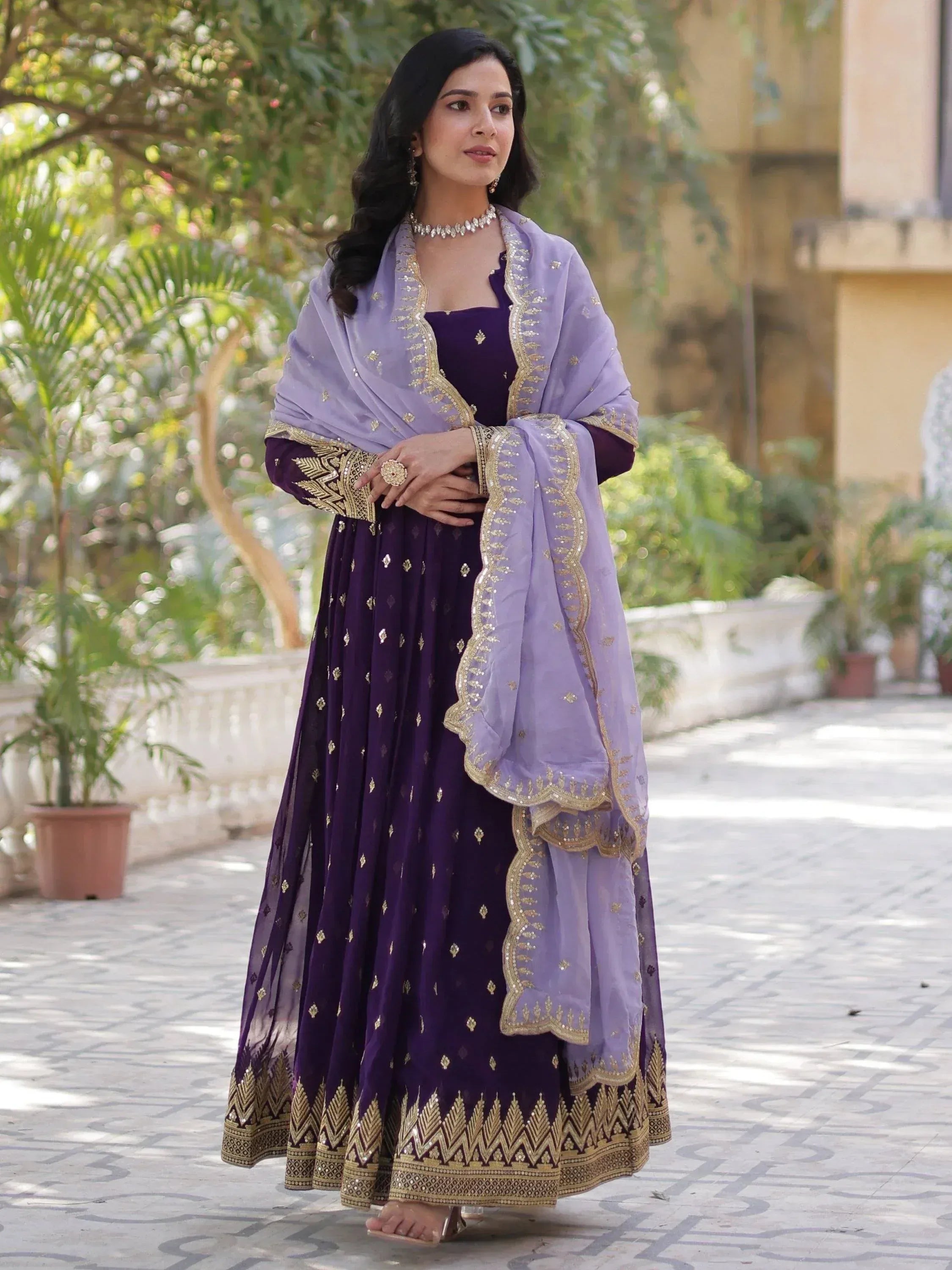Purple and lavender designer anarkali with gold embroidery, perfect for Indian ethnic occasions