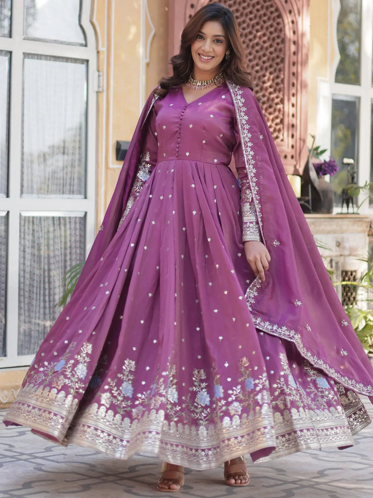 Pretty Mauve Zari Work Viscose Silk Festive Wear Gown With Dupatta