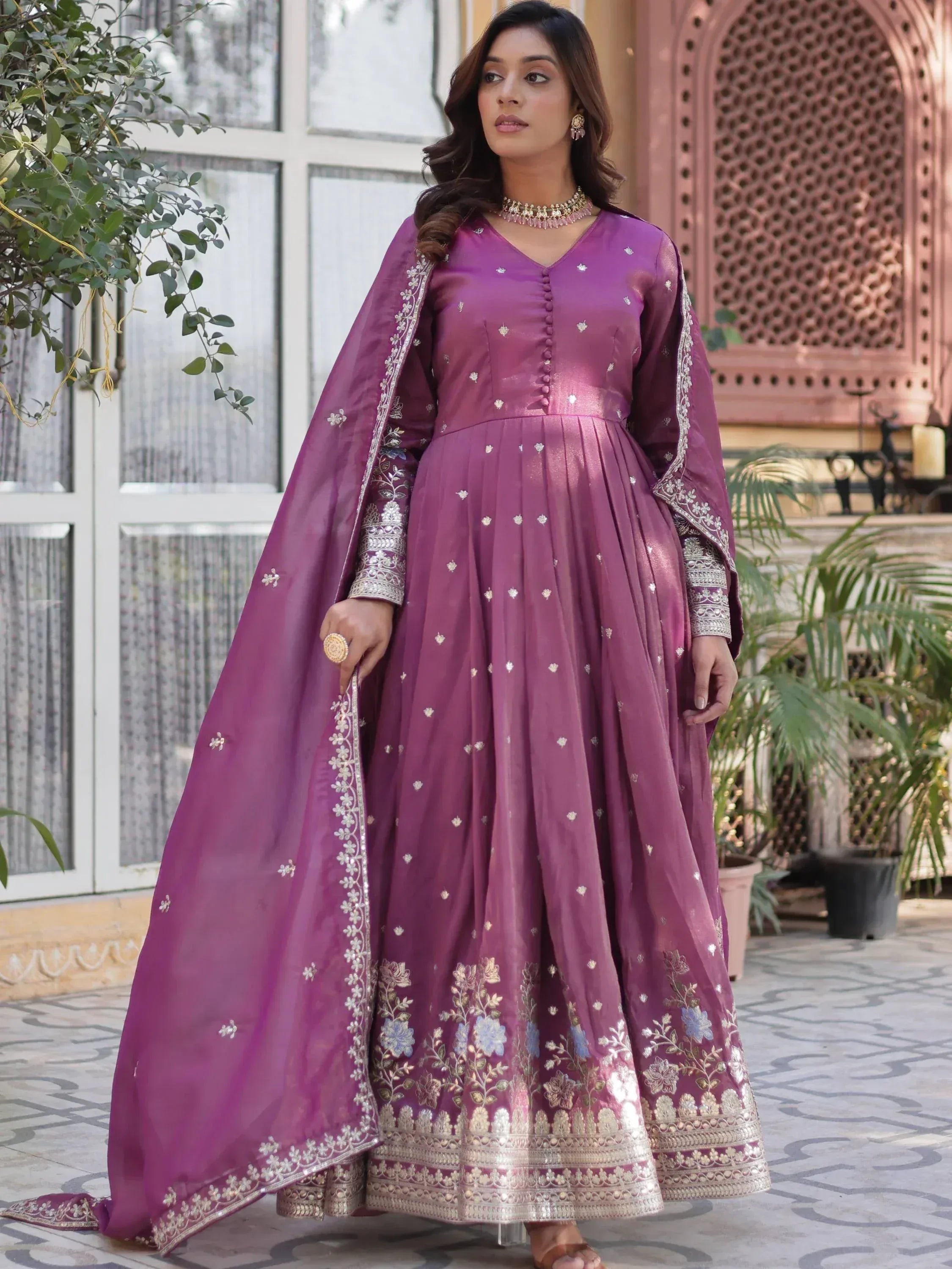 Purple Indian ethnic anarkali gown with gold embroidery, perfect for weddings and festivals