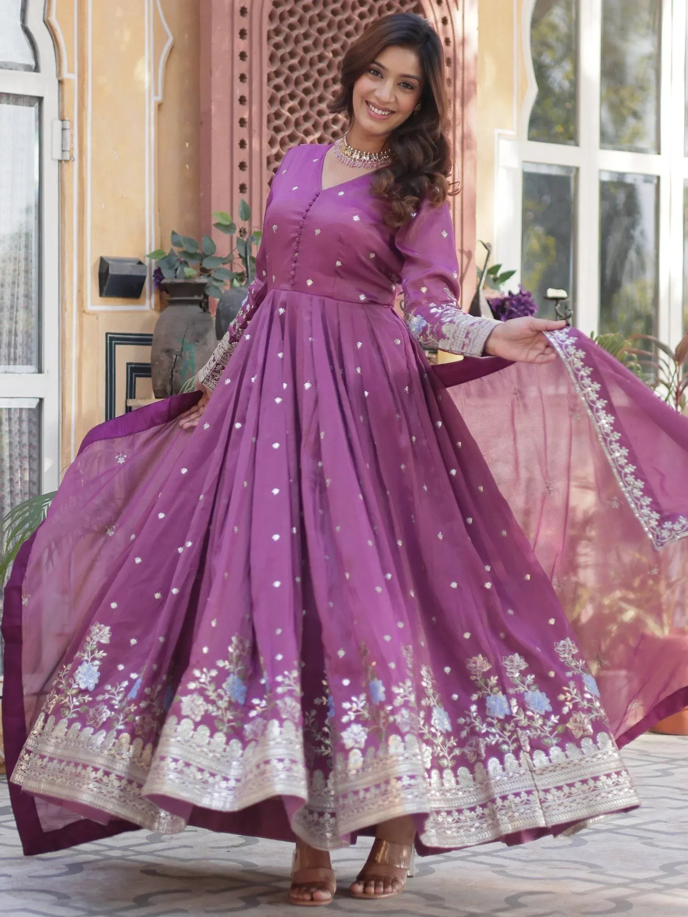Purple embroidered anarkali gown with floral motifs, perfect for Indian ethnic wear occasions