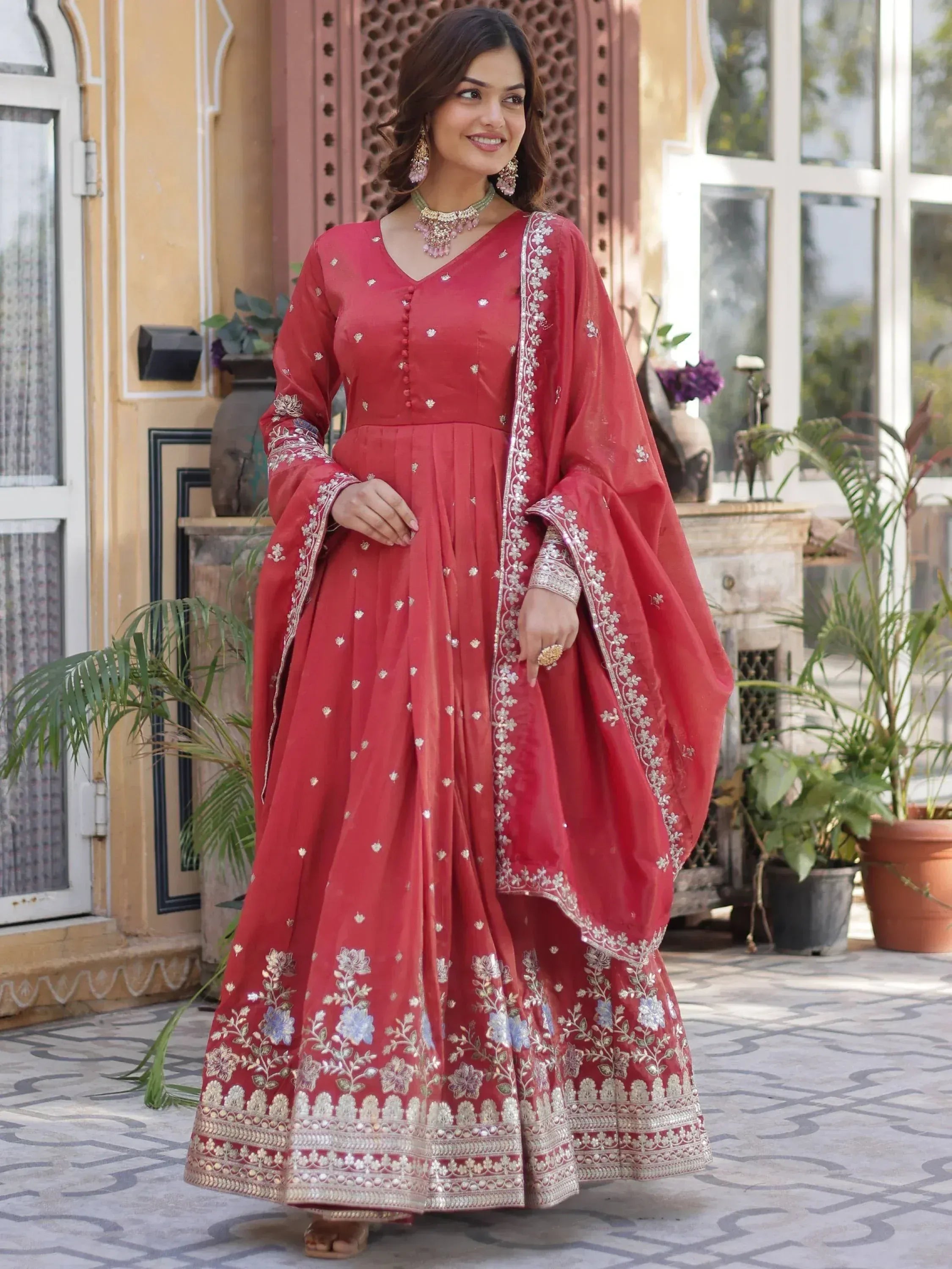 Red embroidered anarkali suit with floral detailing, perfect for Indian ethnic wear occasions
