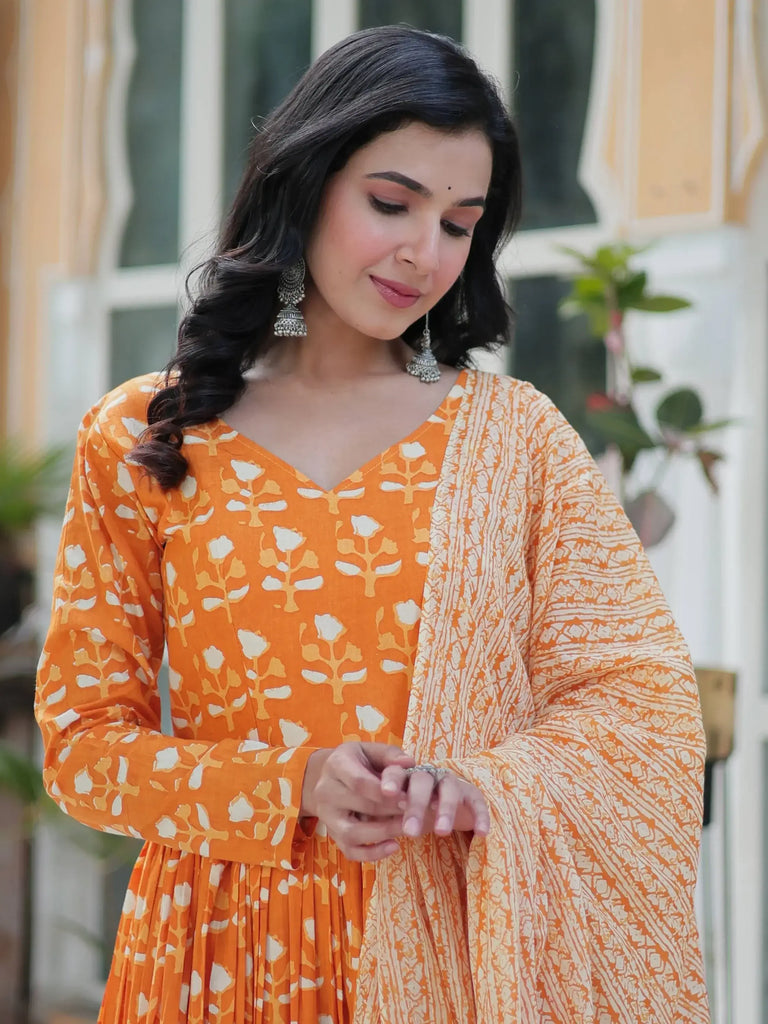 Alluring Orange Floral Printed Cotton Anarkali Suit With Dupatta