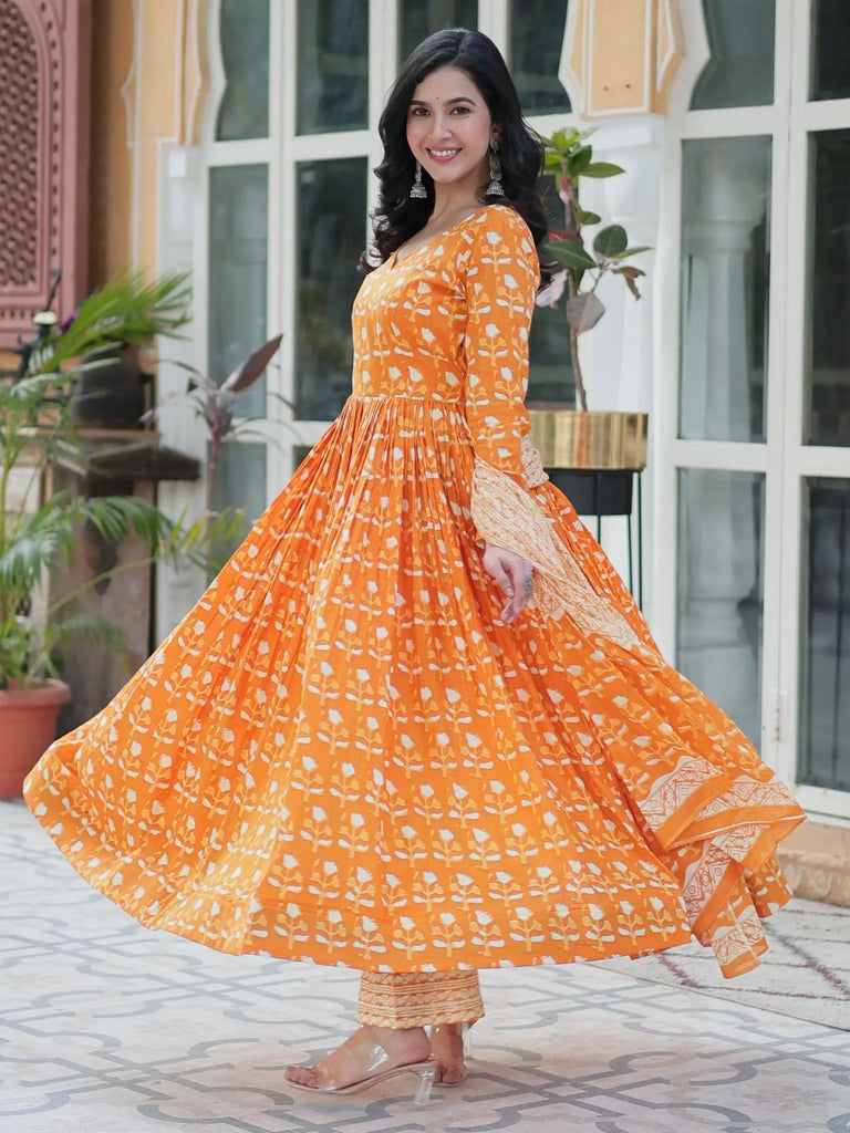 Alluring Orange Floral Printed Cotton Anarkali Suit With Dupatta