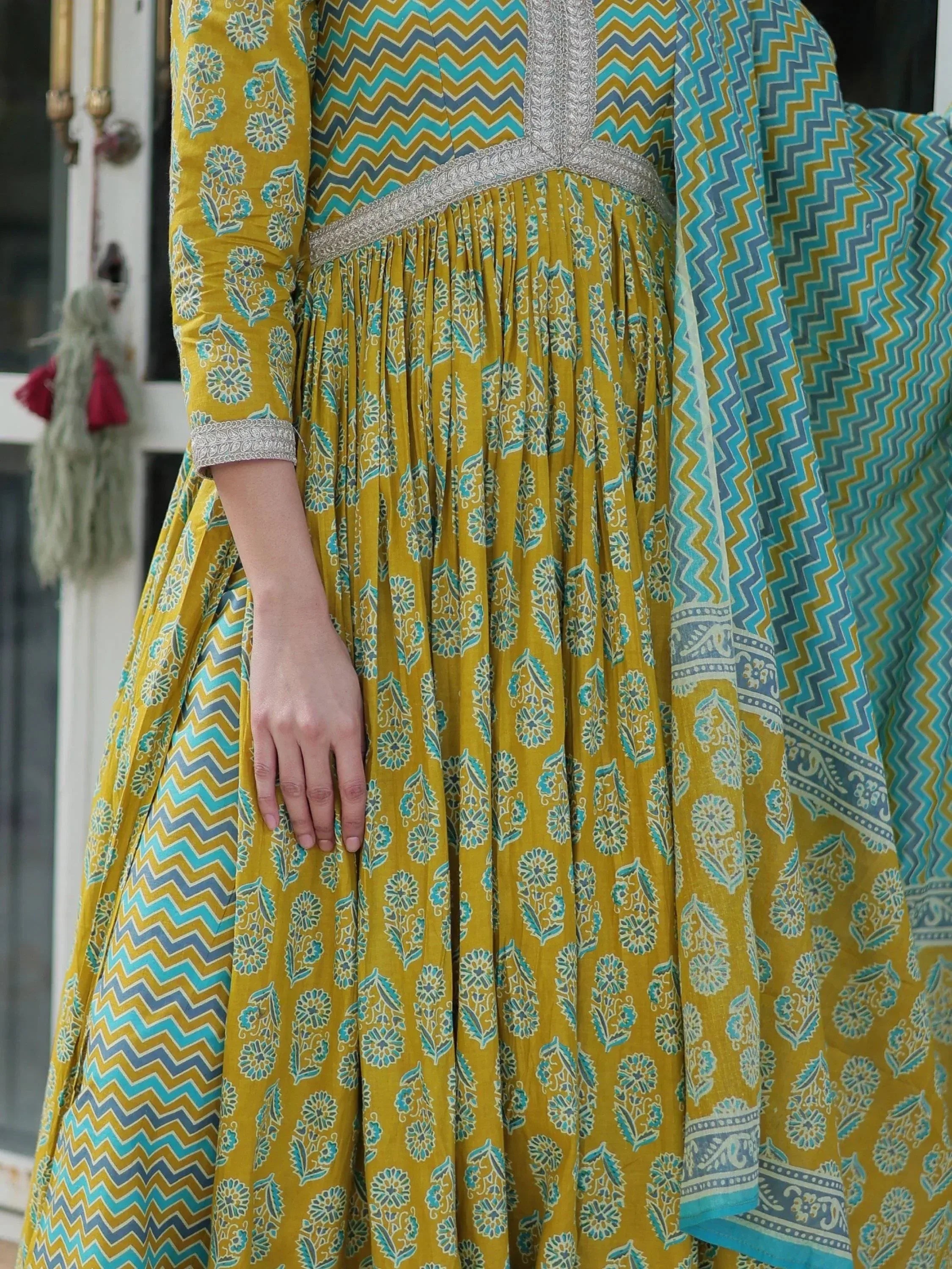 Yellow and blue printed ethnic anarkali with silver embroidery and chevron dupatta