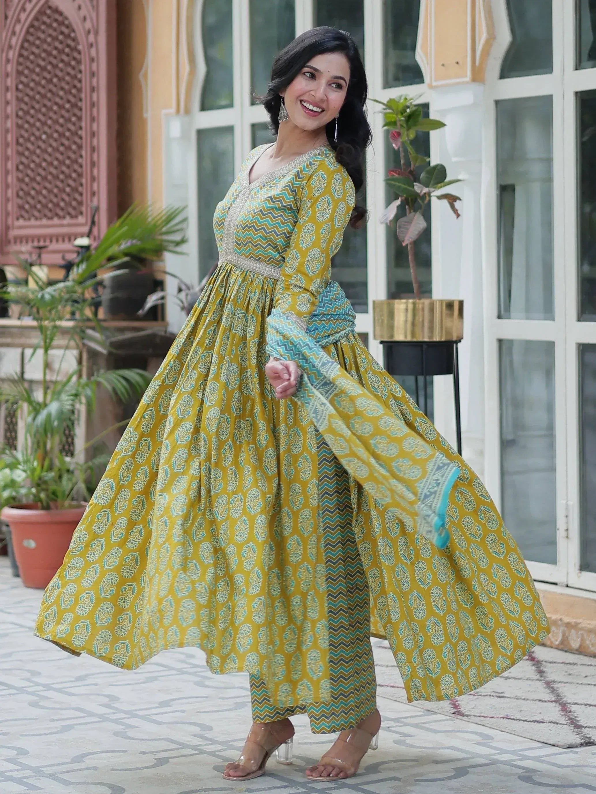 Yellow and blue printed ethnic anarkali gown with flared skirt, perfect for Indian occasions