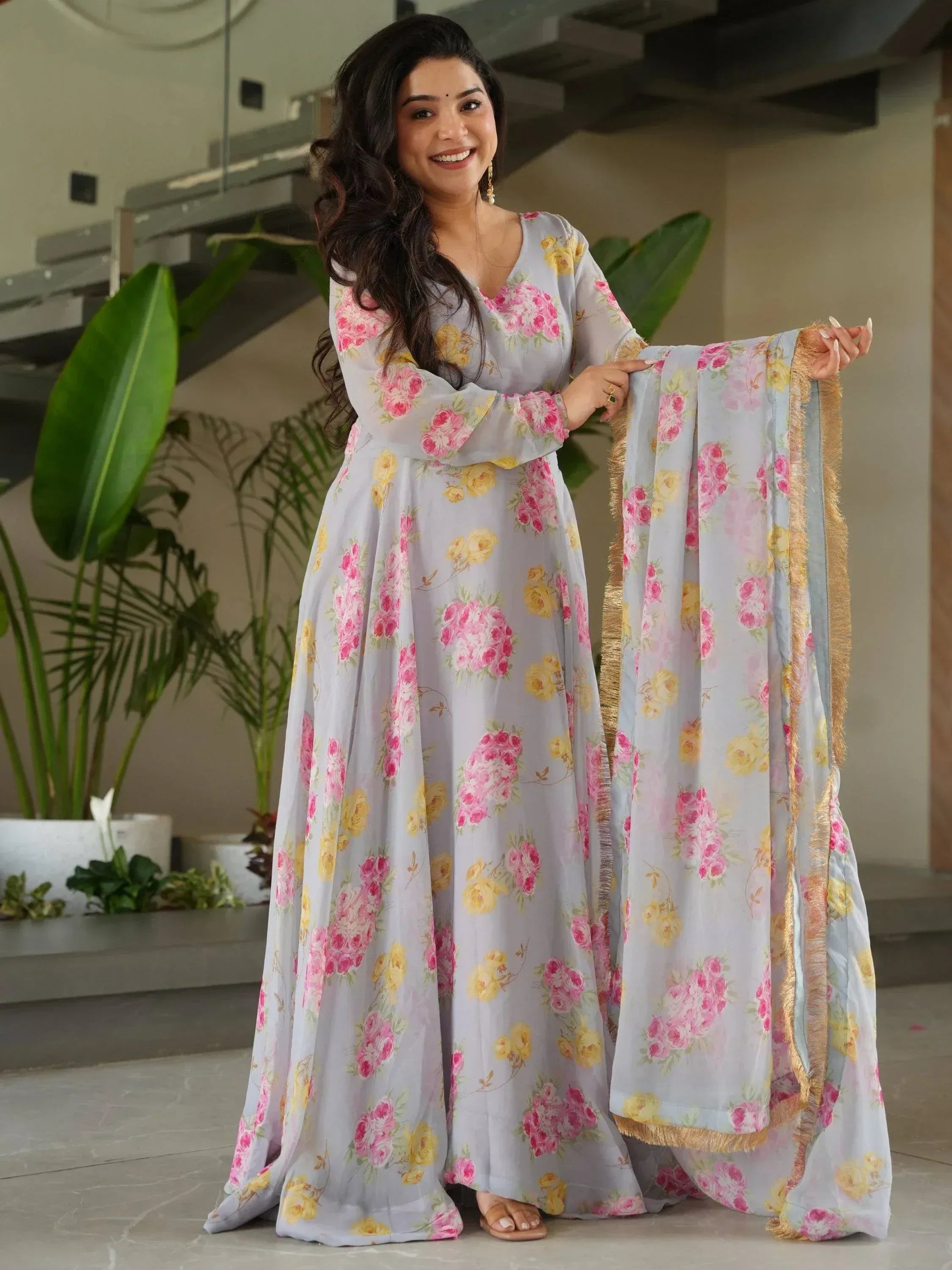 Floral print ethnic gown with matching dupatta, perfect for Indian occasions and festive wear.