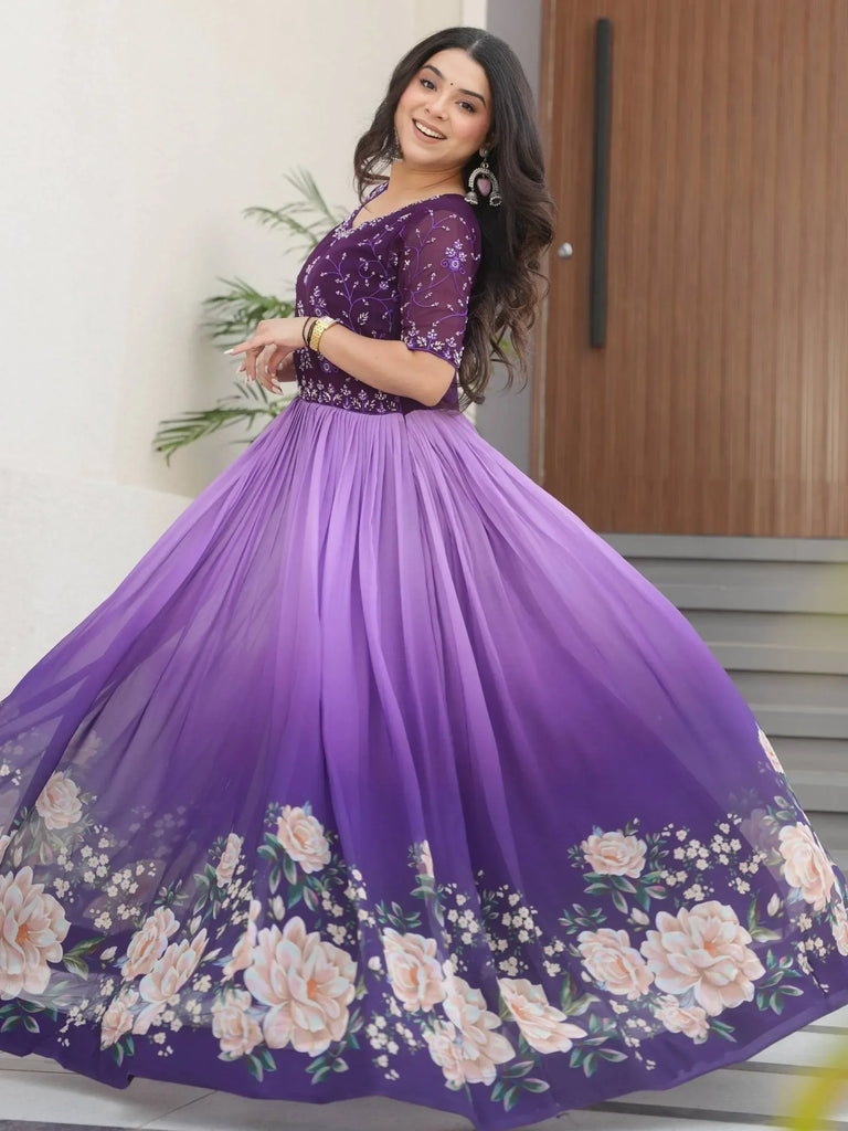 Purple floral ethnic gown with embroidered bodice and pleated skirt, perfect for Indian occasions