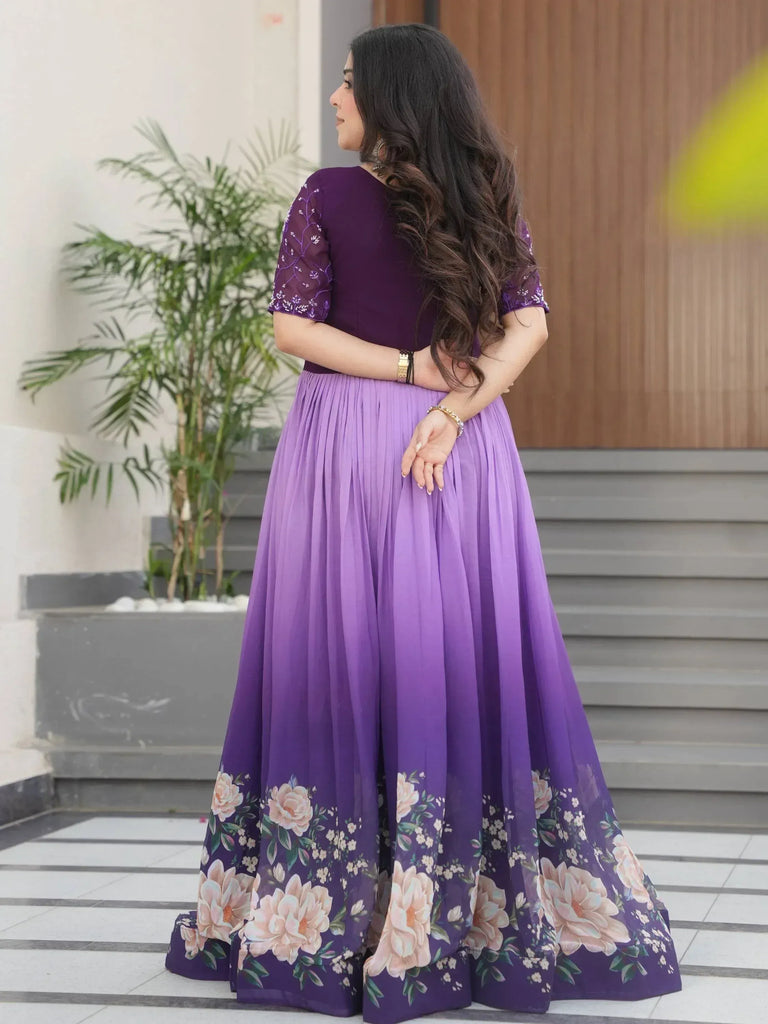 Purple floral ethnic gown with embroidered sleeves, perfect for Indian occasions
