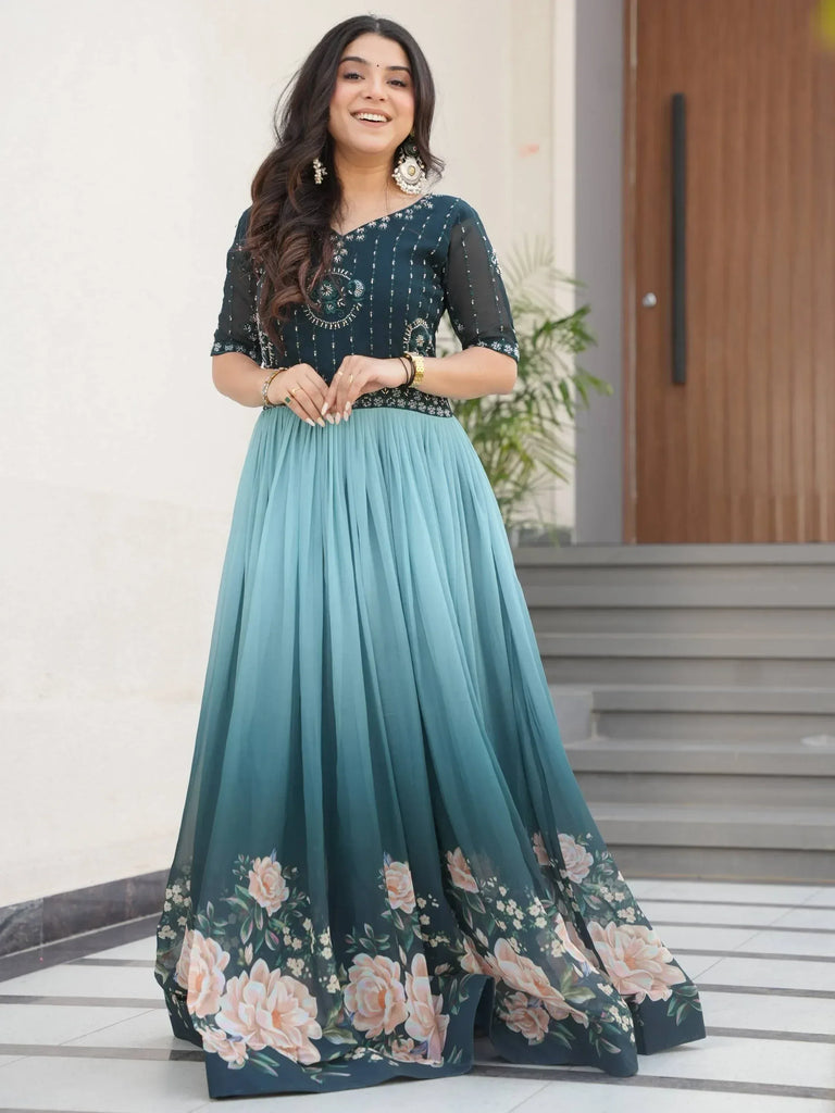 Woman in elegant teal floral anarkali with embroidered bodice, perfect for Indian ethnic occasions