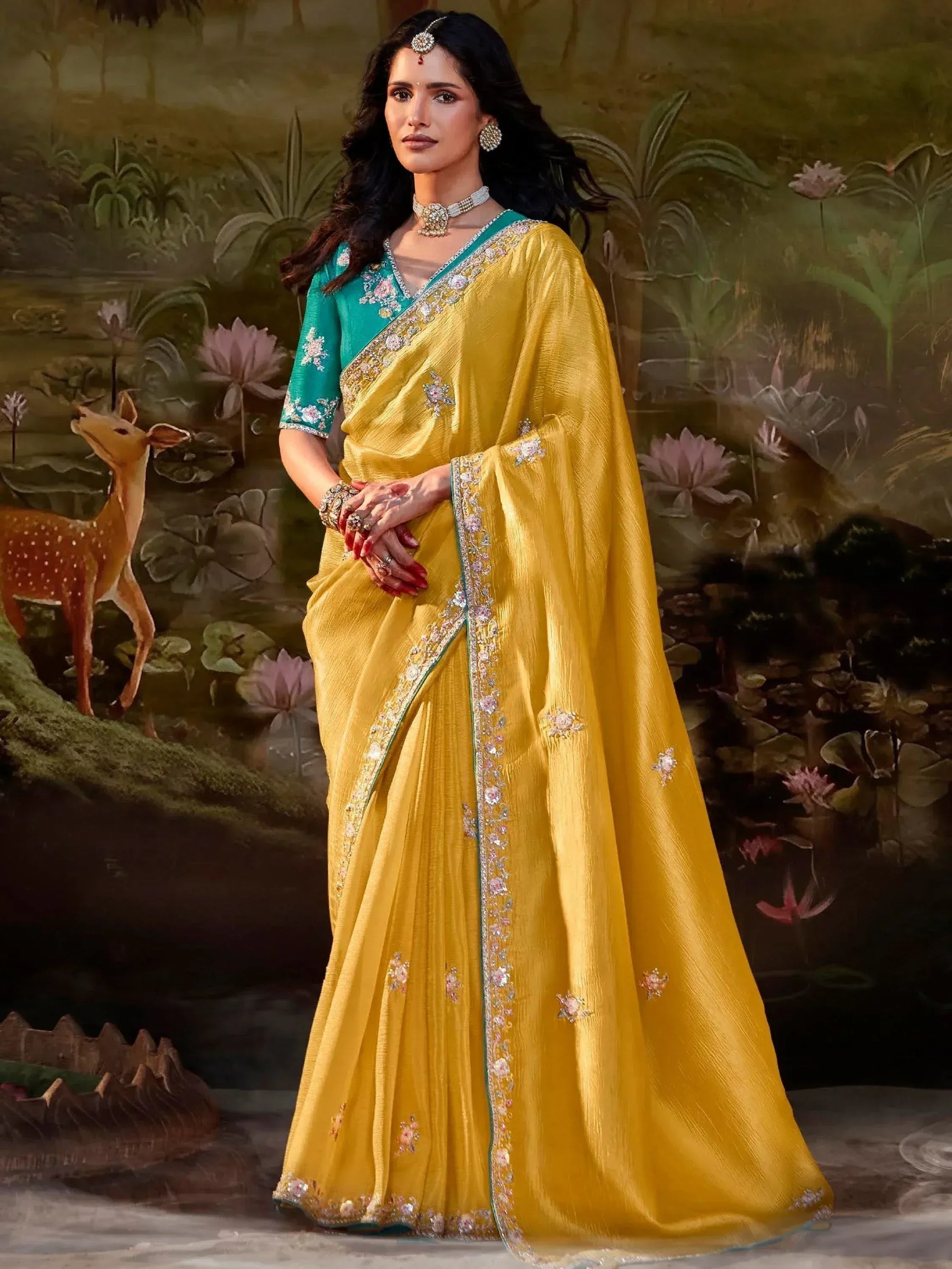 Yellow embroidered saree with green blouse, perfect for Indian ethnic wear occasions