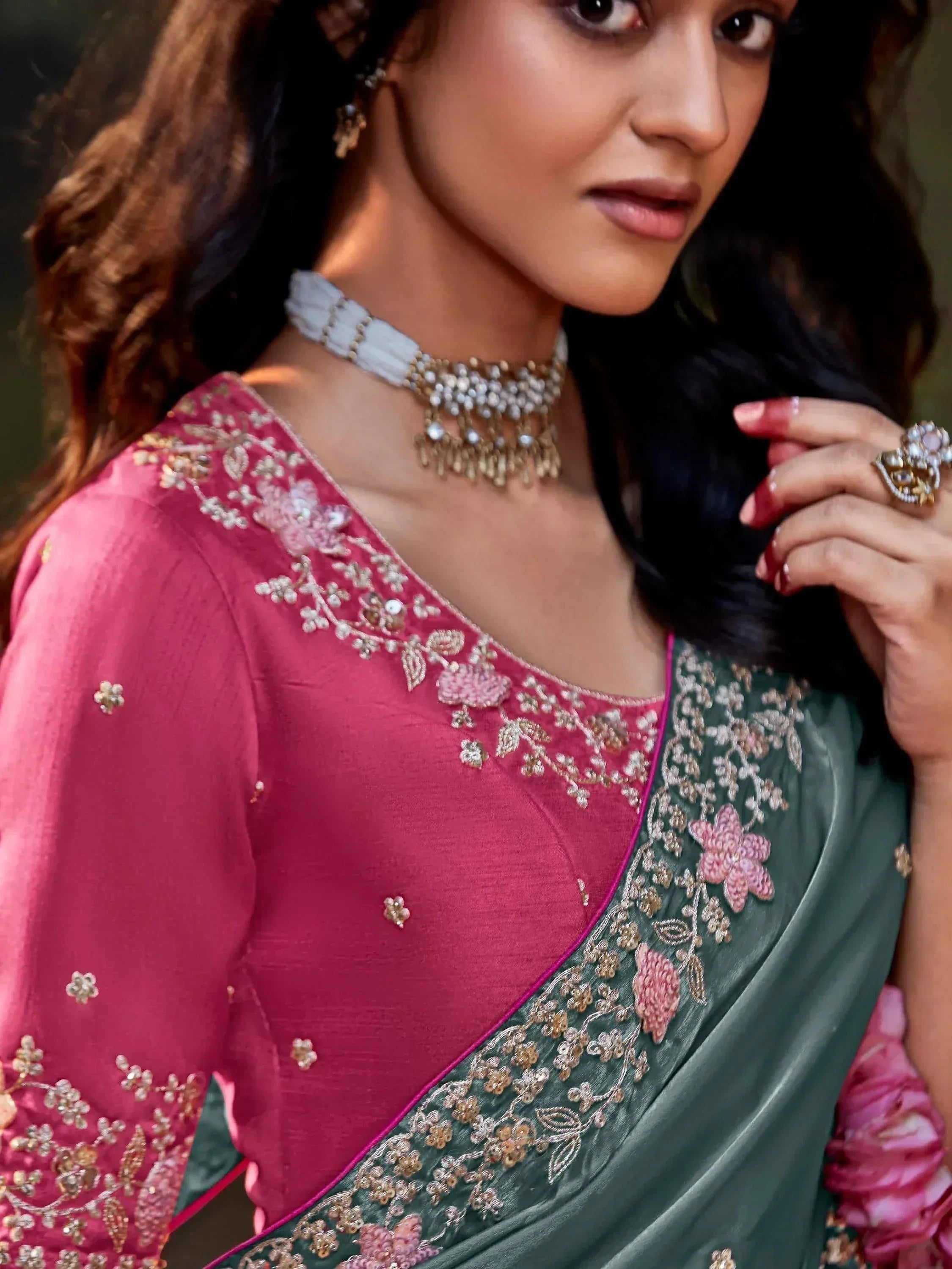 Pink and green embroidered saree with floral detailing, perfect for Indian ethnic wear occasions.