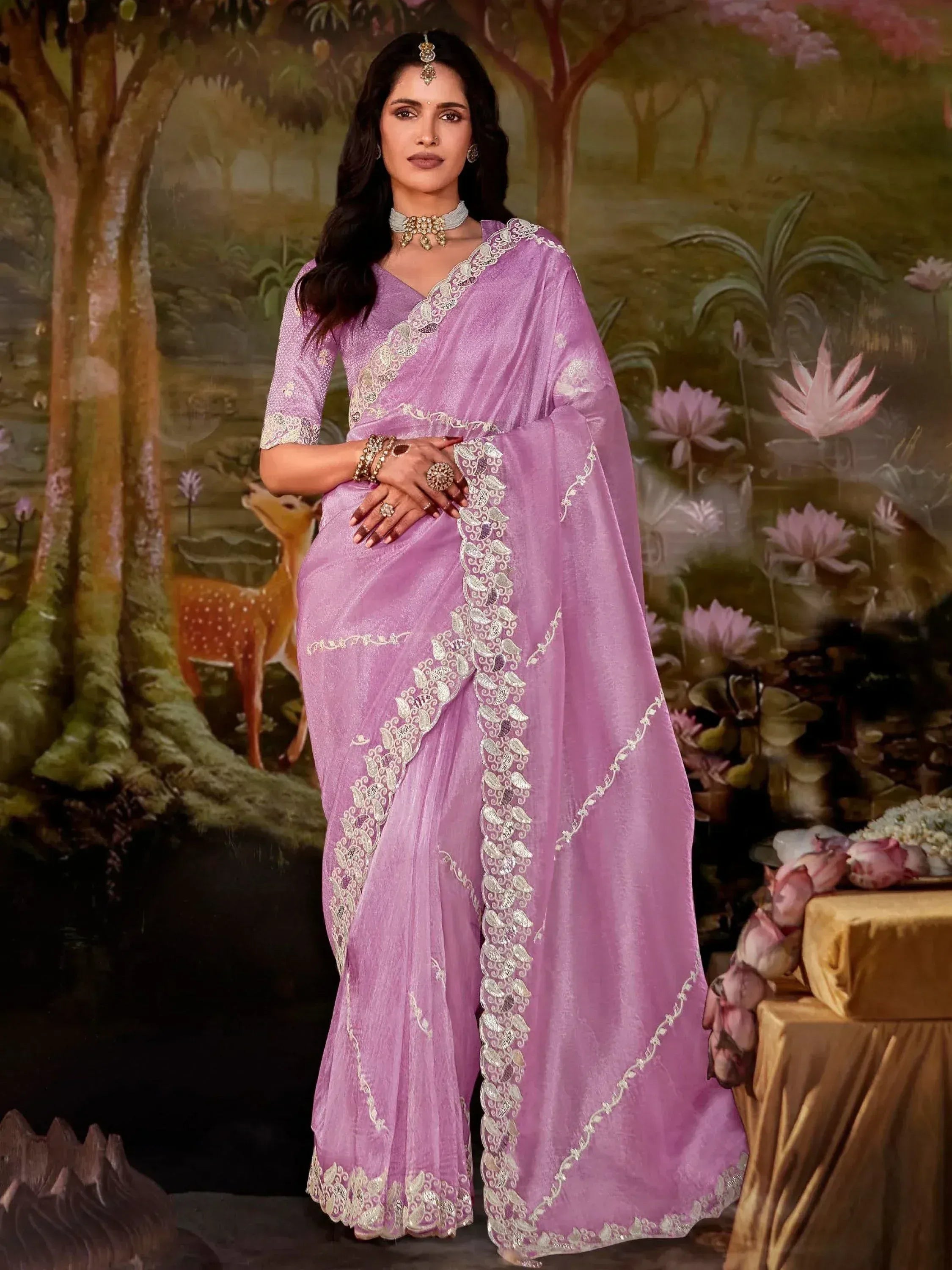 Lavender ethnic saree with silver lace detailing, perfect for Indian occasions and festive wear.