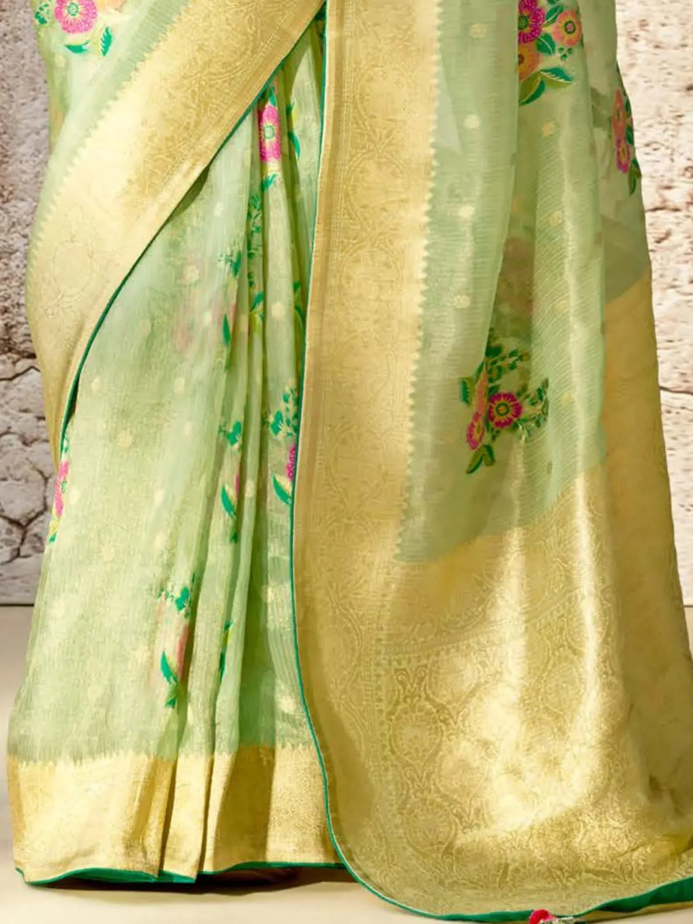 Light green saree with floral embroidery and golden border, ethnic Indian wear