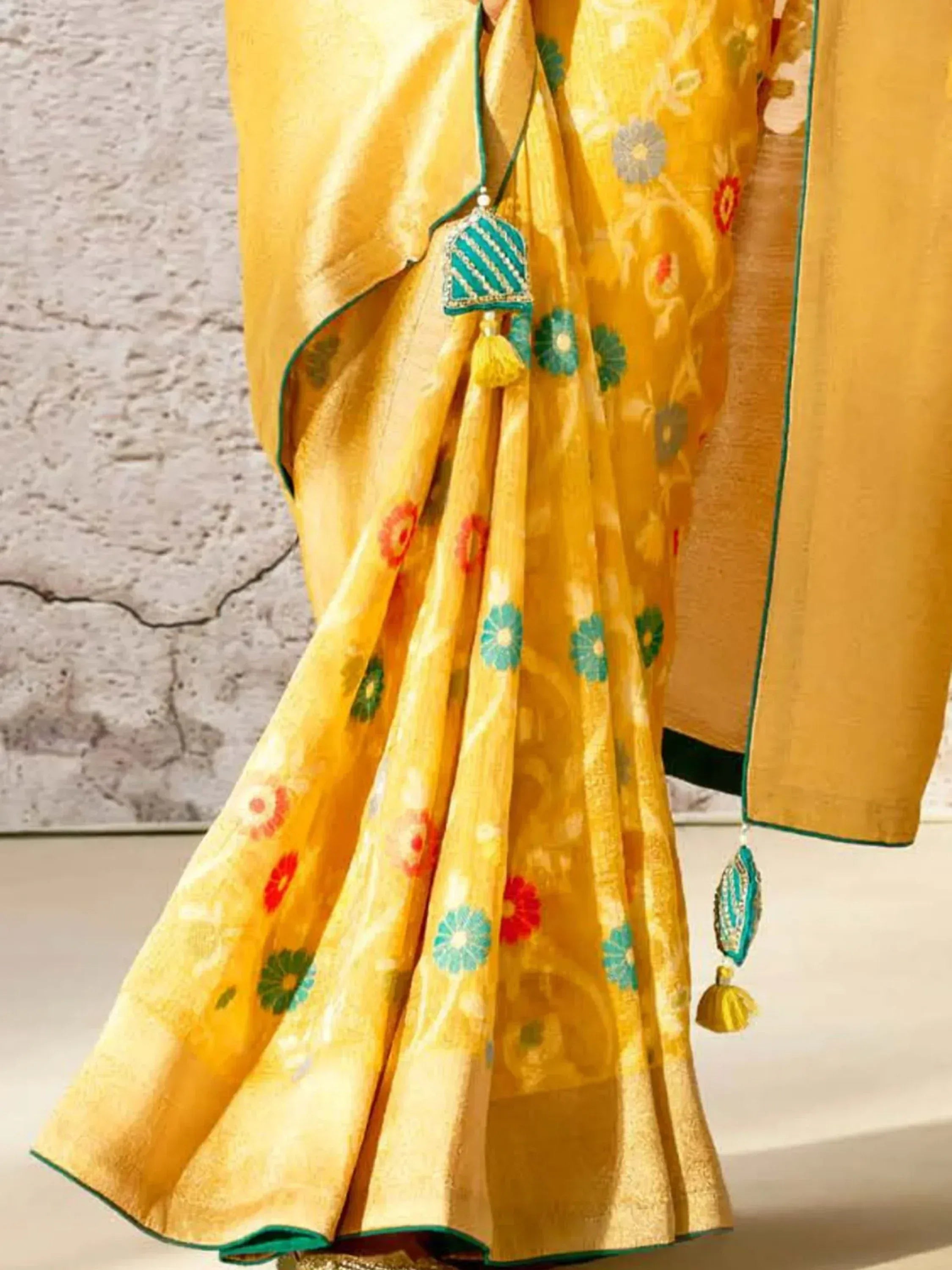 Yellow floral embroidered saree with green border and tassels, Indian ethnic wear