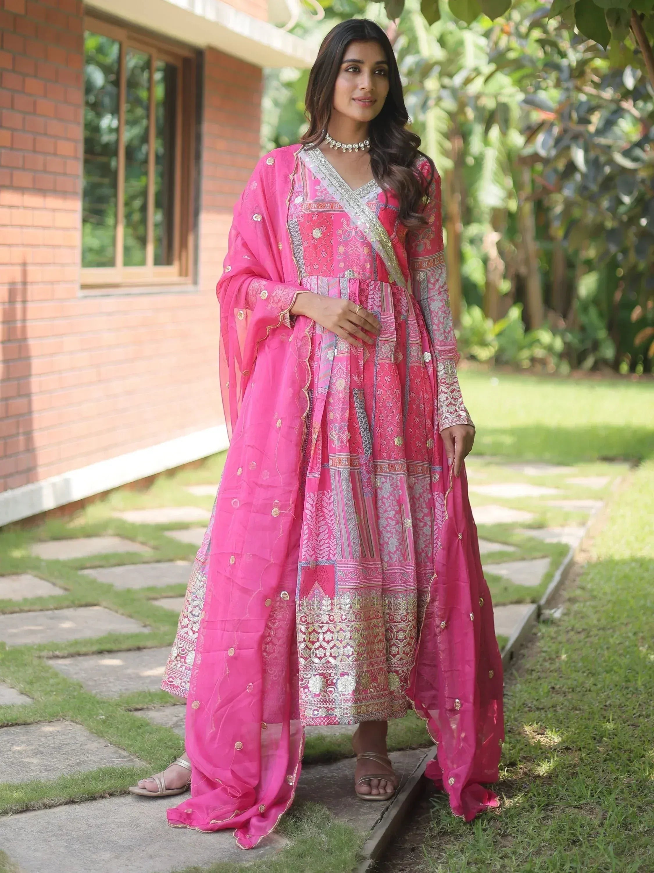Pink printed ethnic anarkali suit with dupatta, perfect for Indian occasions and festivals