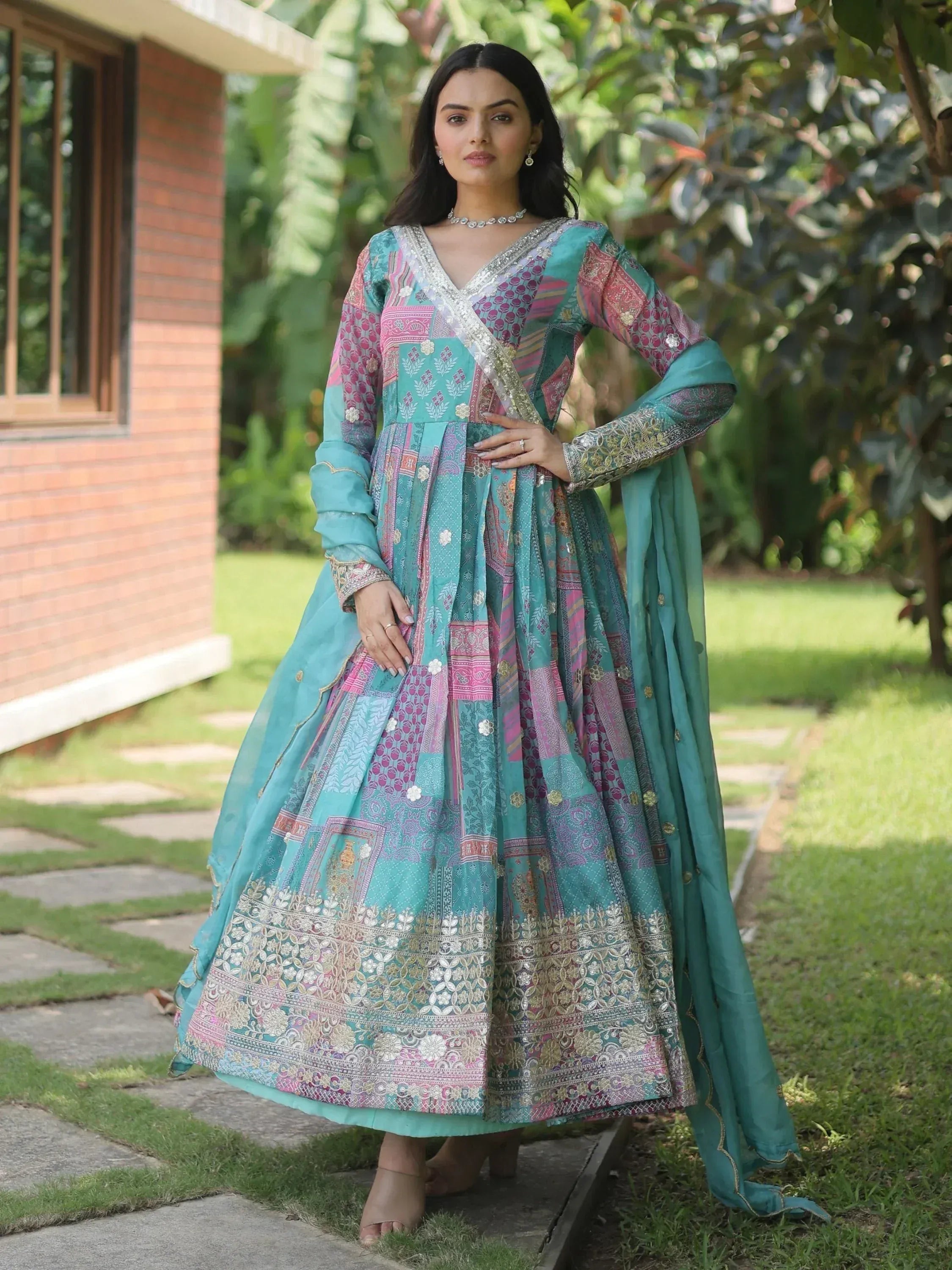 Teal and pink printed anarkali suit with embroidery, perfect for Indian ethnic wear occasions