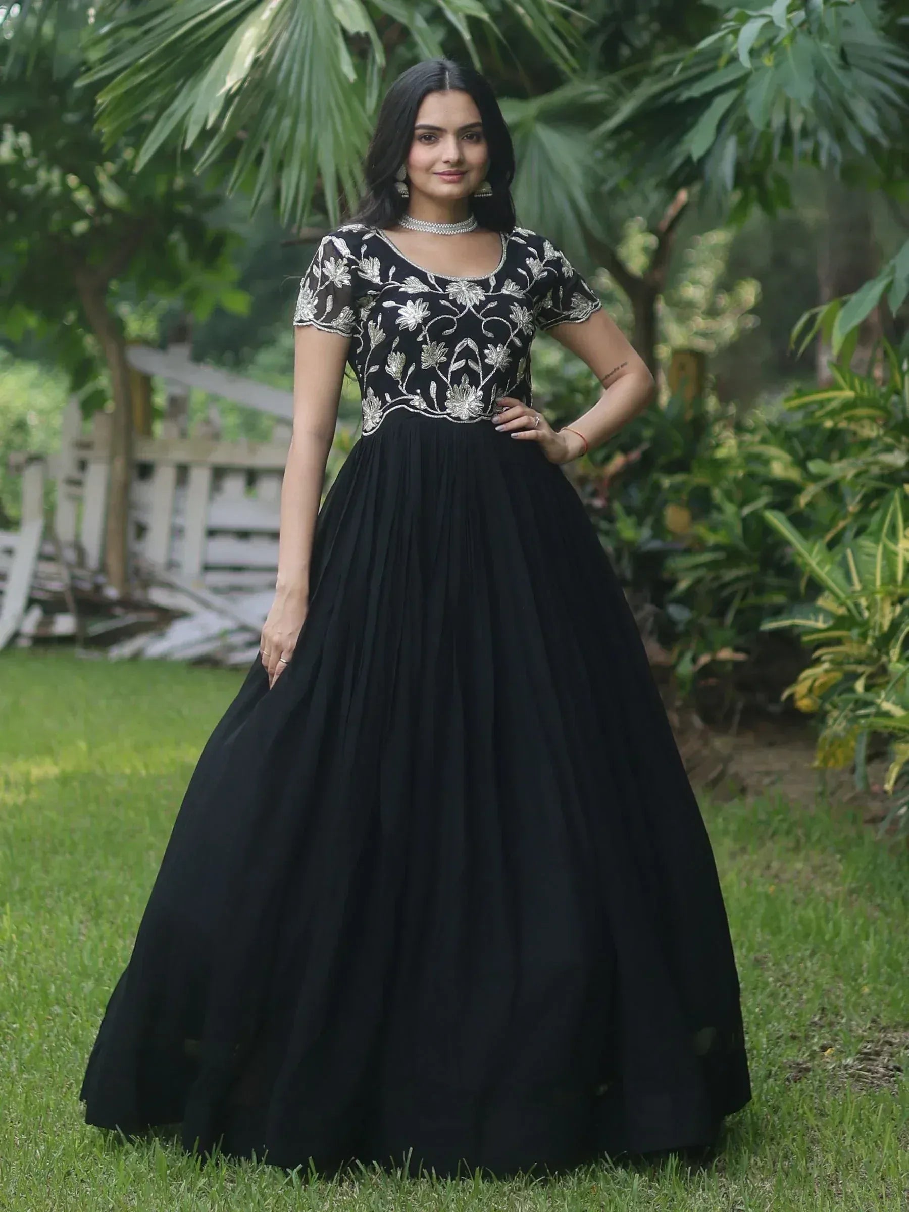 Black ethnic gown with silver floral embroidery, perfect for Indian festive occasions and parties.