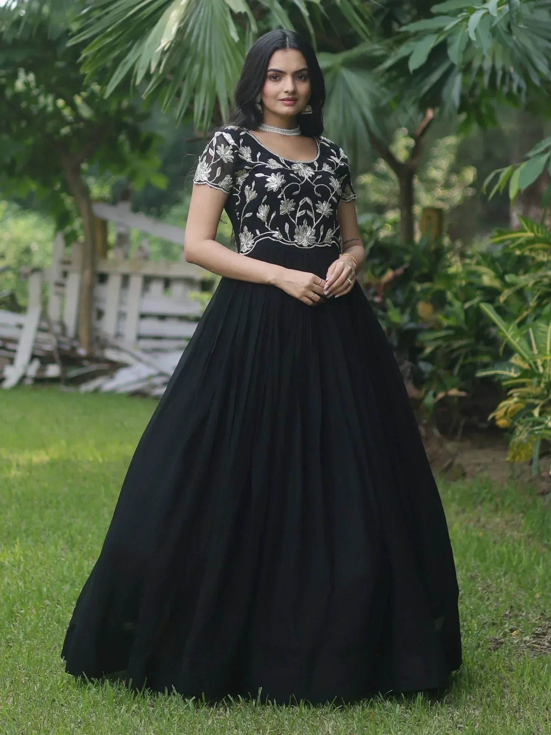 Black ethnic gown with silver floral embroidery, perfect for Indian weddings and parties