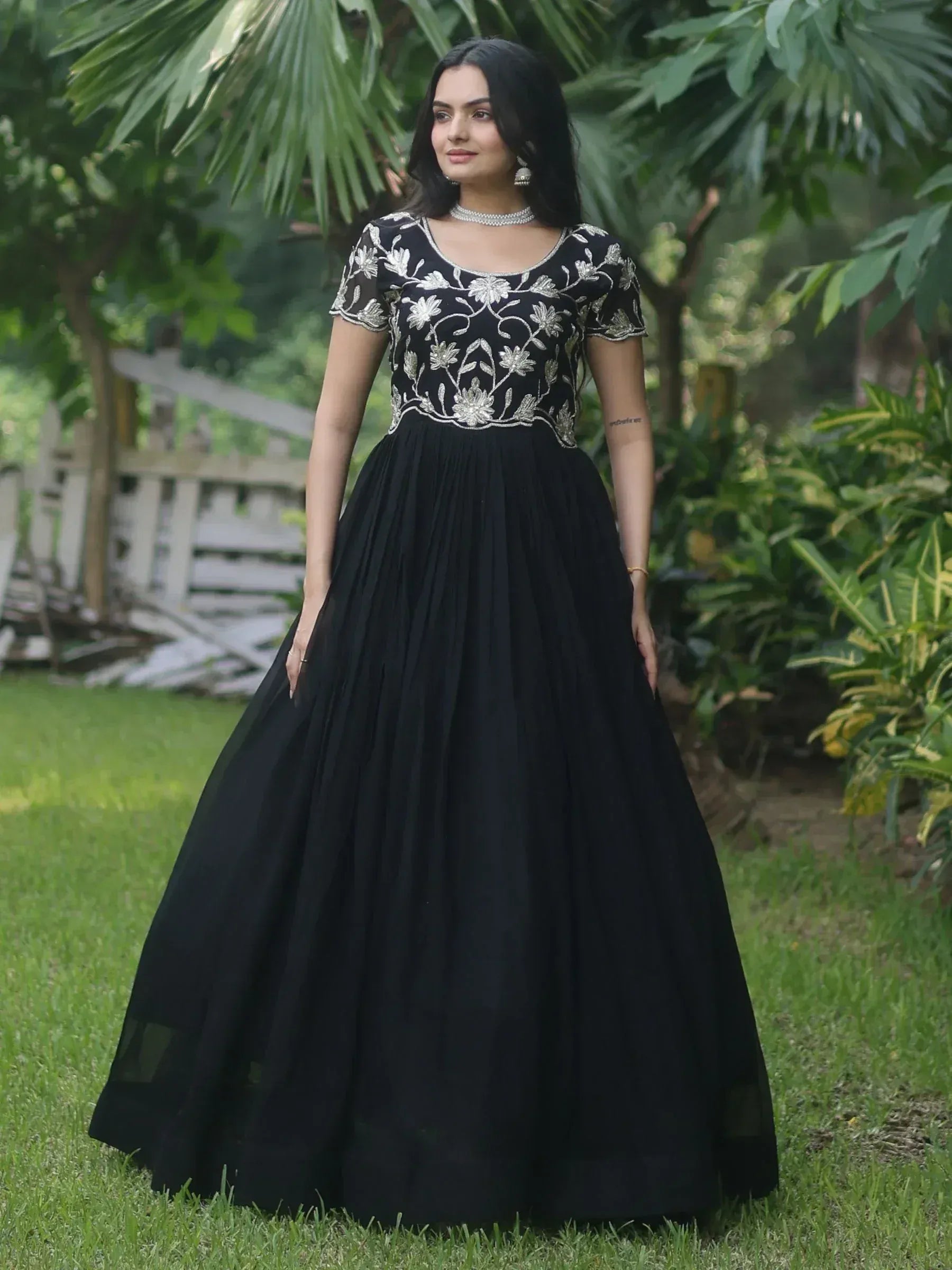 Black ethnic gown with silver floral embroidery, perfect for Indian weddings and parties